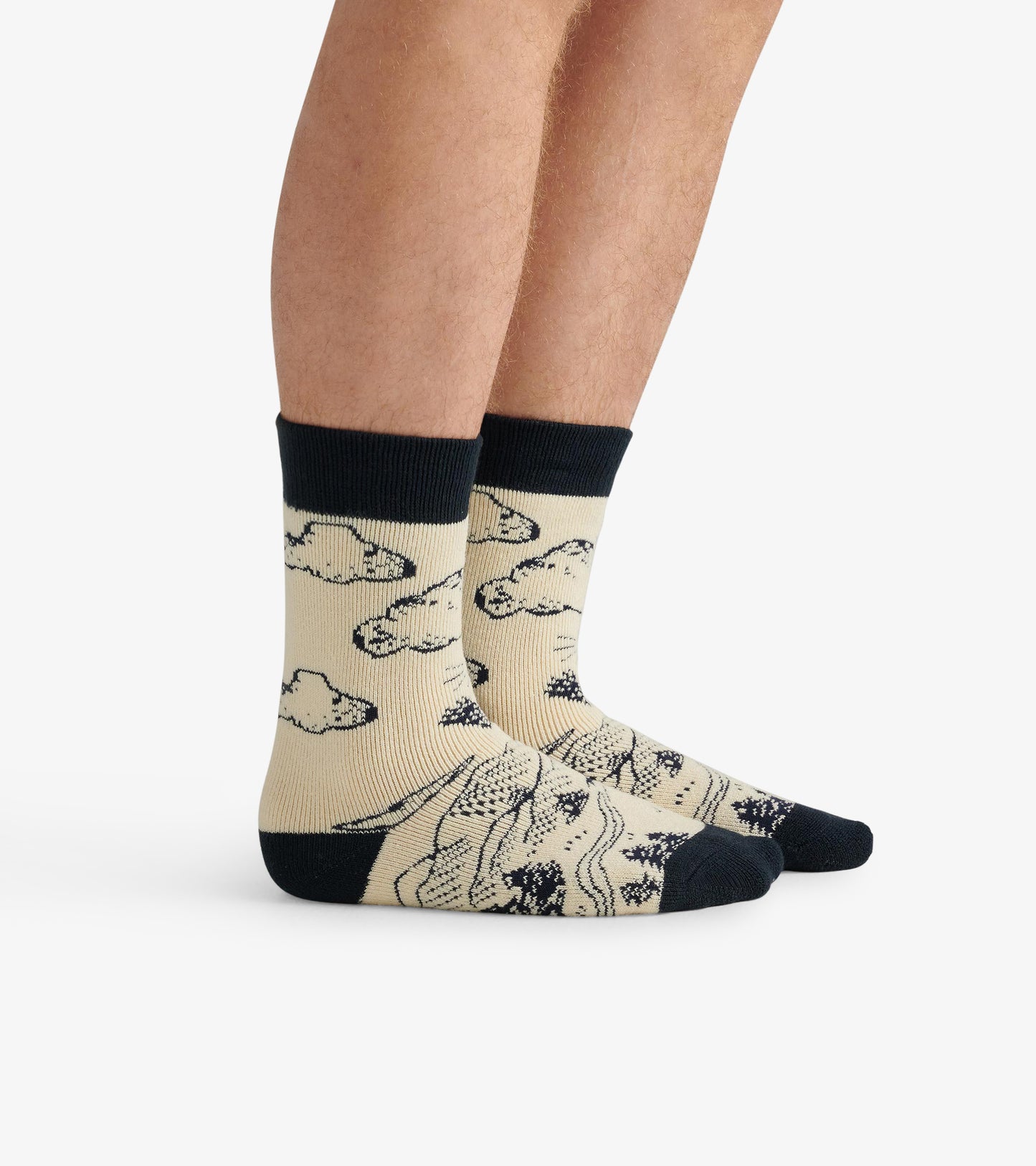 Beige socks with a bear and cloud pattern, featuring a navy ribbed cuff and toe, suitable for casual wear.