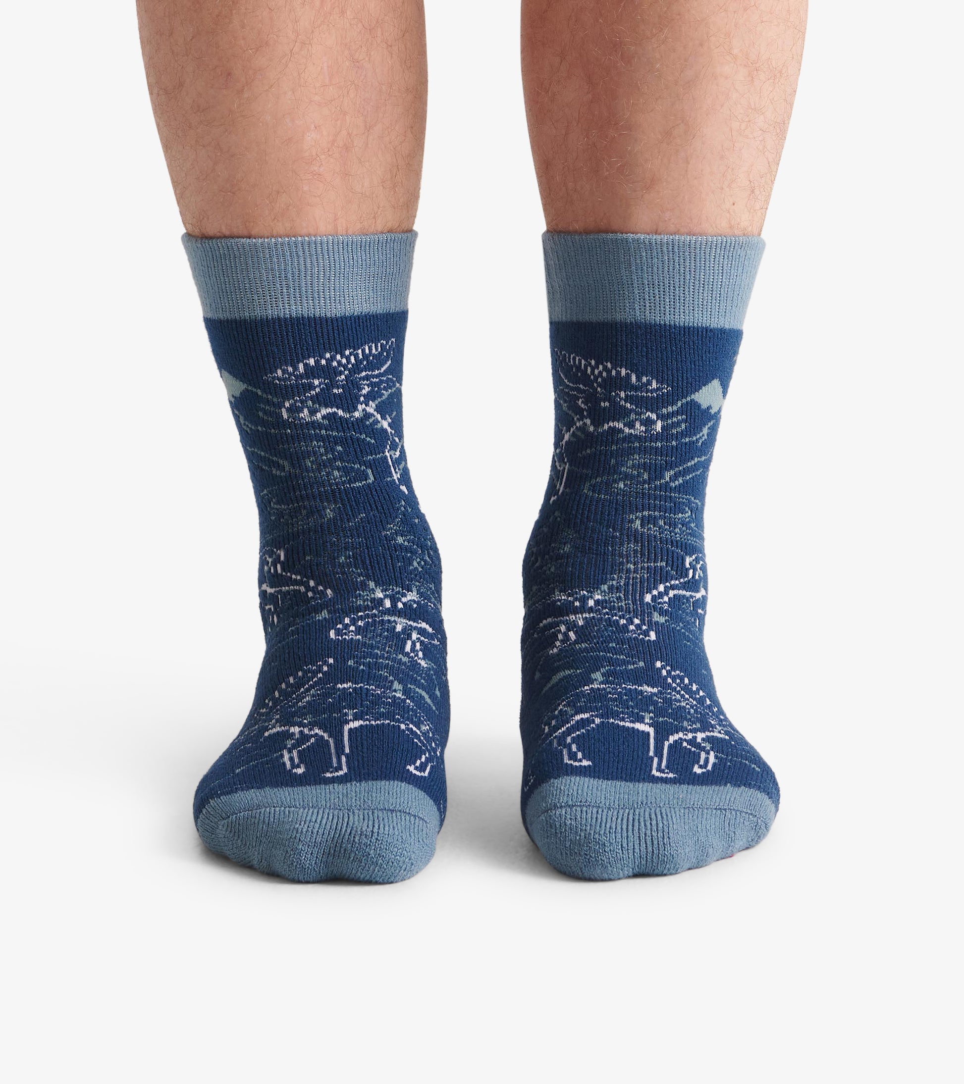 Cozy blue socks featuring a moose pattern, with a contrasting light blue cuff and toe. One size fits most.