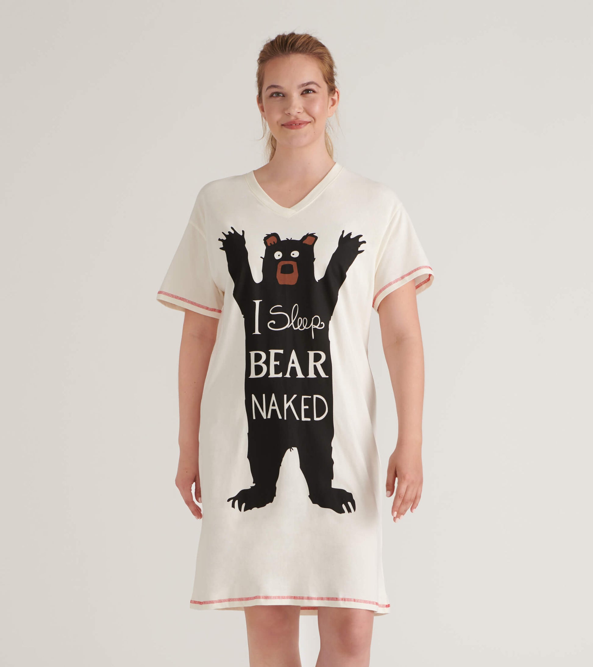 Cream-colored sleepshirt with a black bear graphic and text, featuring a V-neck and short sleeves.