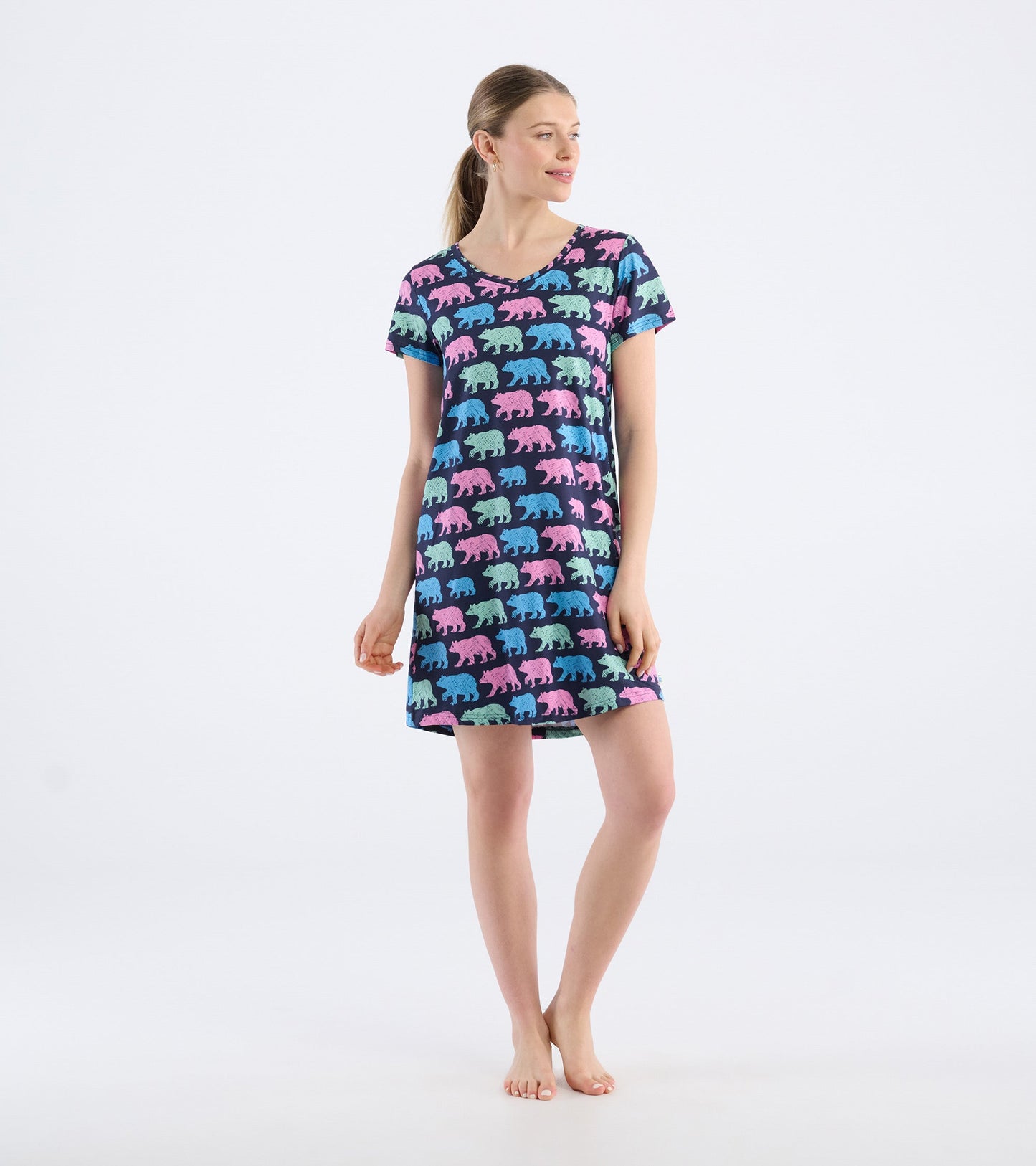 Short-sleeve nightdress featuring colorful bear patterns on a navy background, ideal for casual loungewear.