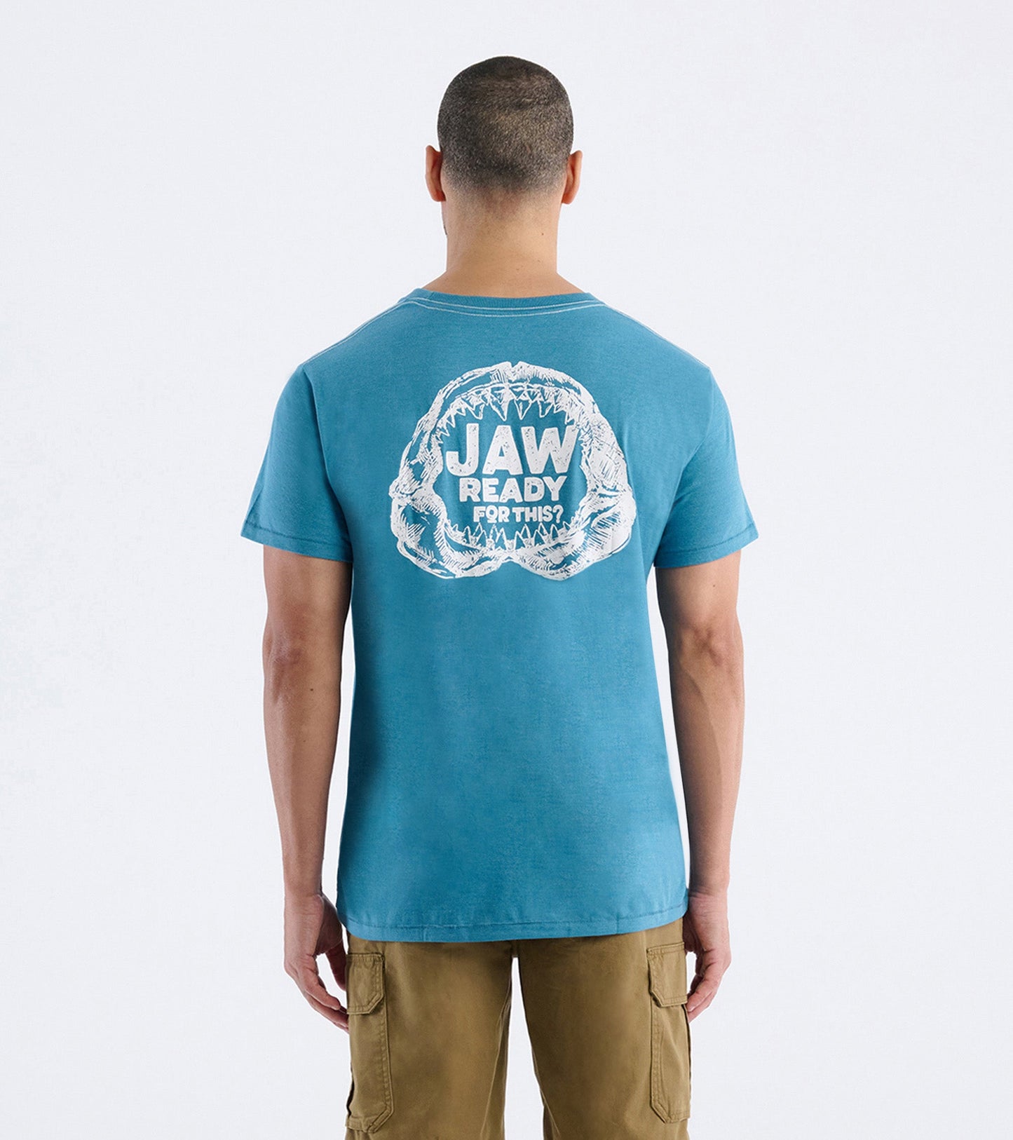 Men's short-sleeve tee in teal featuring a graphic of a shark jaw on the back.
