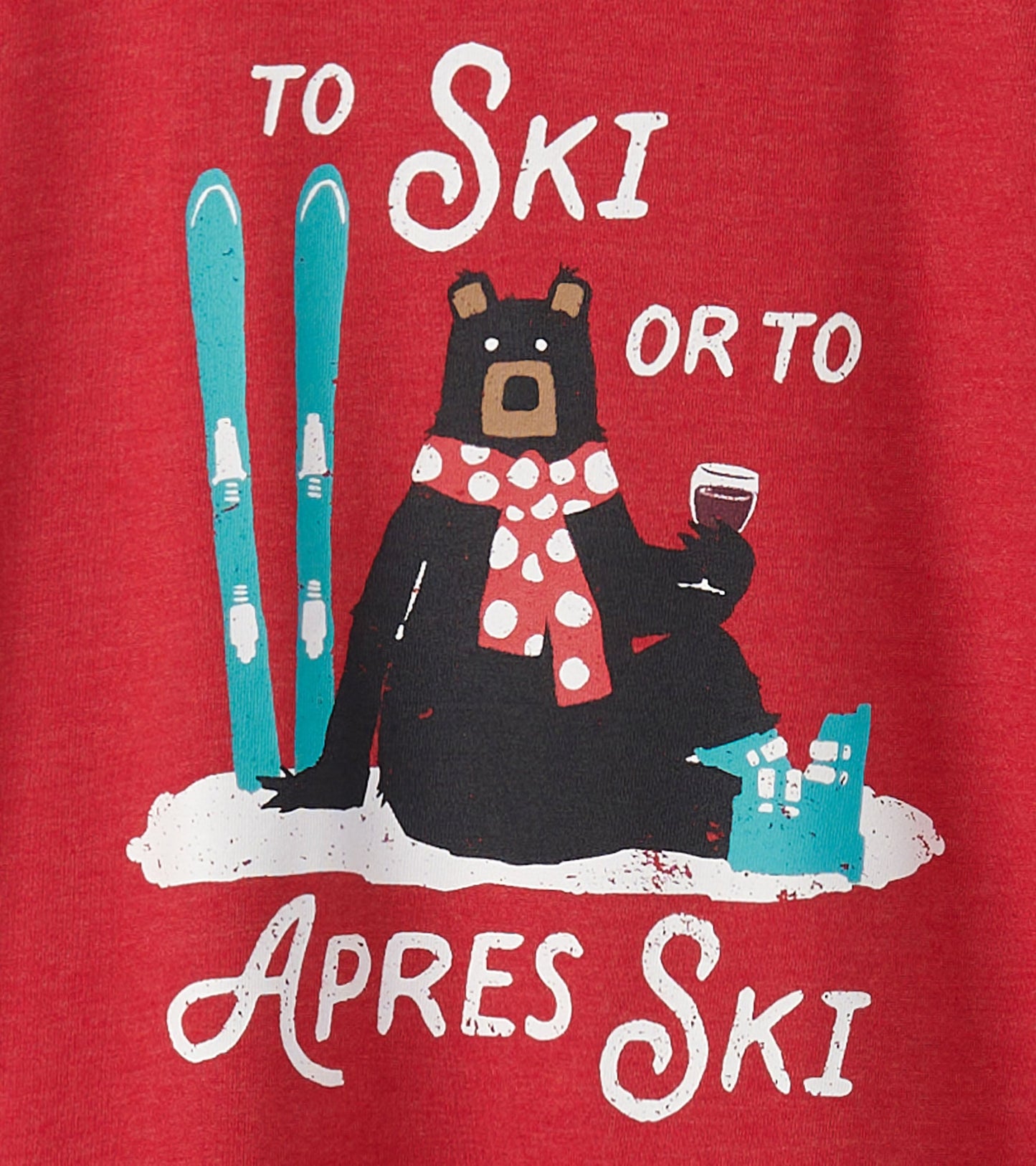 Red pajama tee featuring a bear in a scarf, skis, and a drink, with the text "To Ski or To Apres Ski.