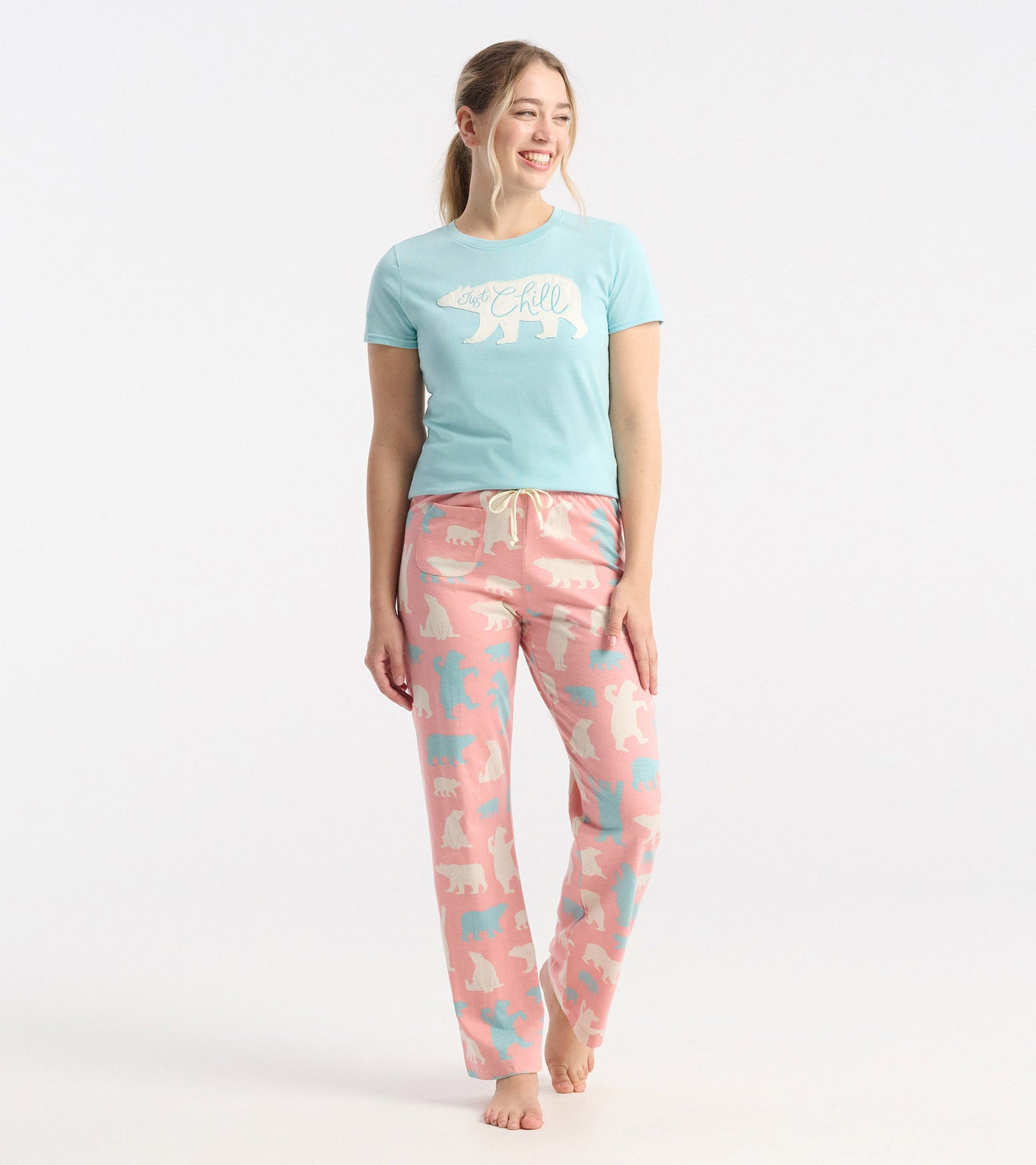 Light blue pajama tee with "Just Chill" text, paired with pink pants featuring bear patterns in white and blue.