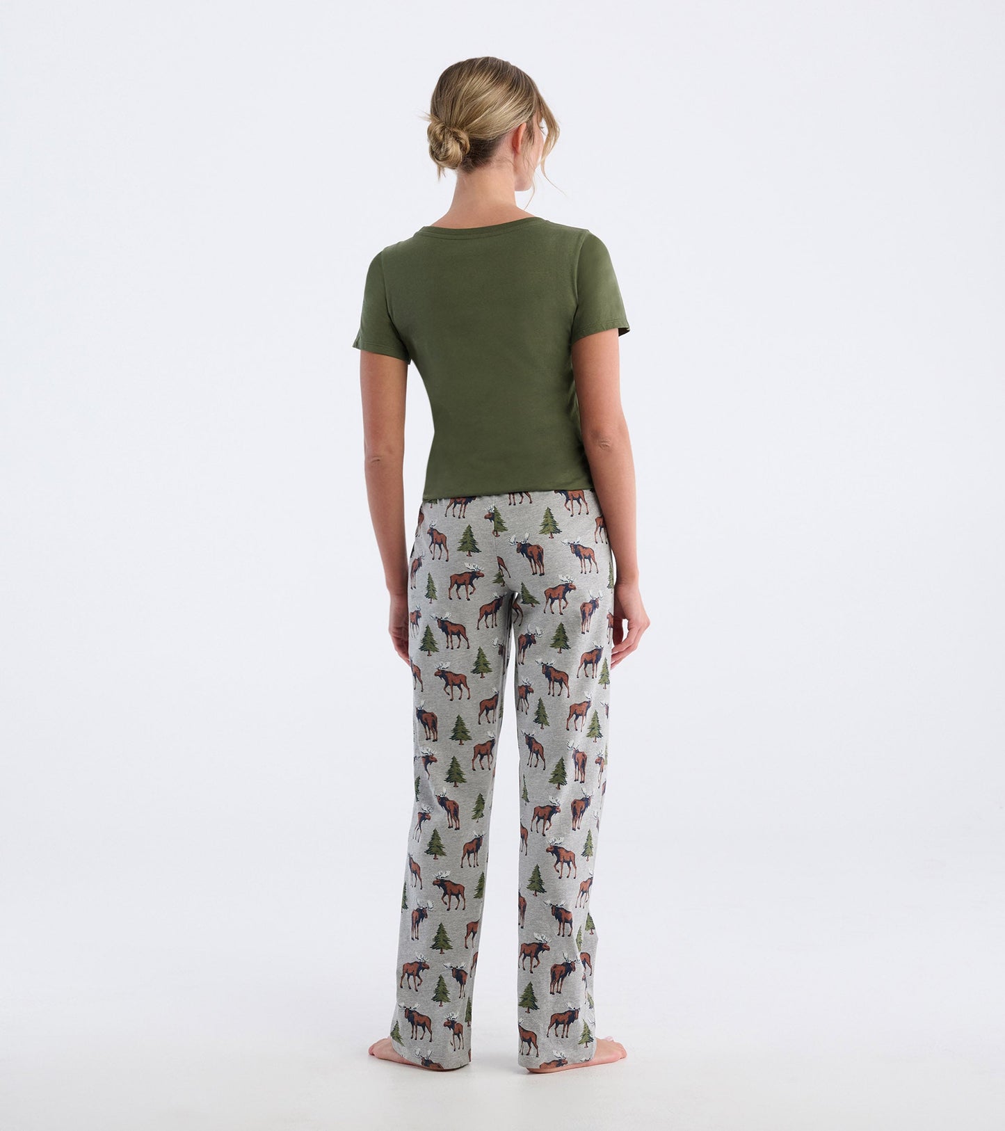 Olive green short-sleeve pajama t-shirt paired with gray pants featuring moose and pine tree patterns, viewed from the back.