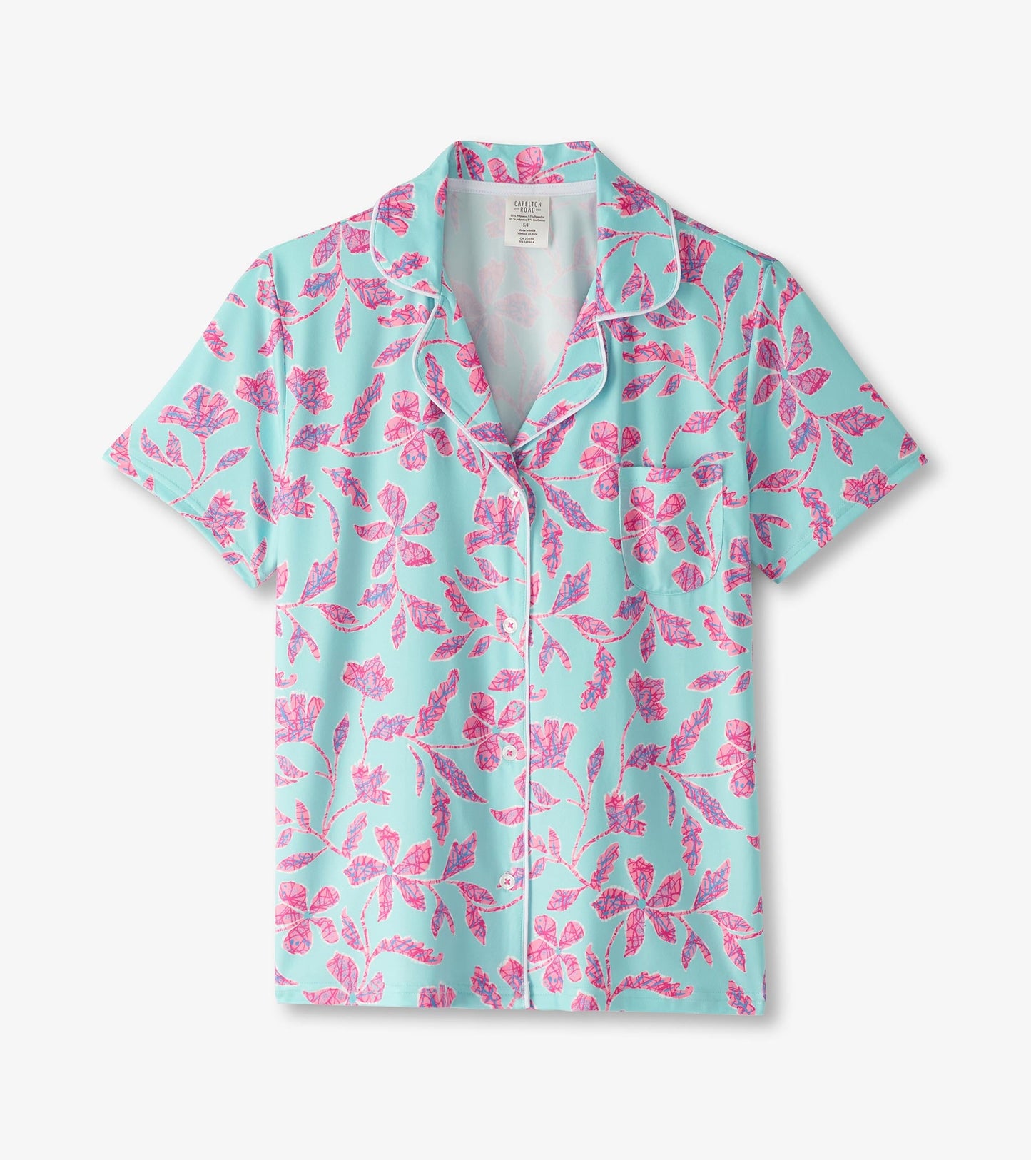 Turquoise short pajama top featuring a vibrant pink batik flower pattern and a classic collar.