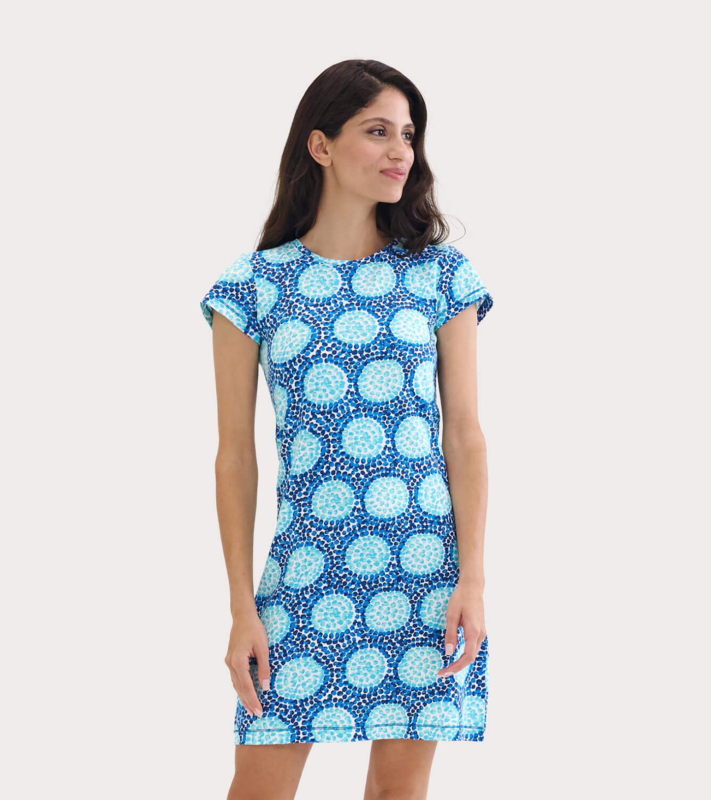 Short-sleeve crew neck dress in blue with circular pattern, perfect for casual wear.