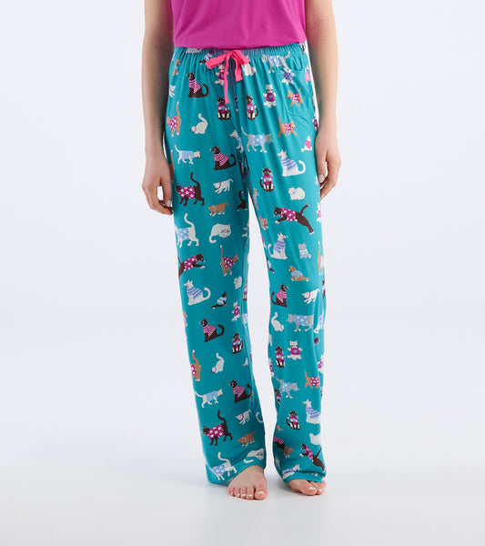 Turquoise polyknit pajama pants featuring a playful cat pattern and a drawstring waist, ideal for lounging.