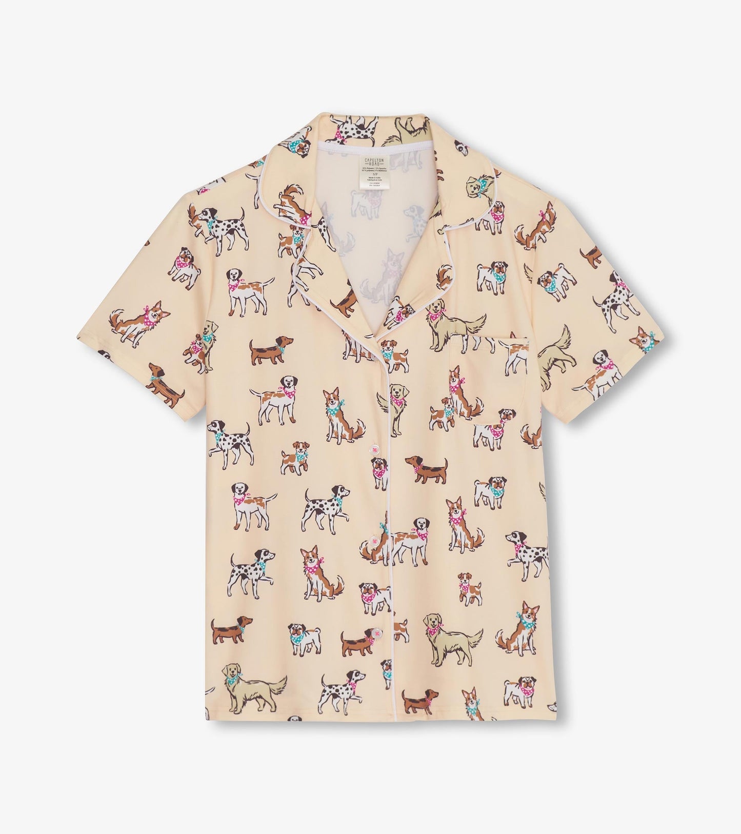 Short pajama set featuring a playful dog print on a light beige background, with a collared shirt and short sleeves.