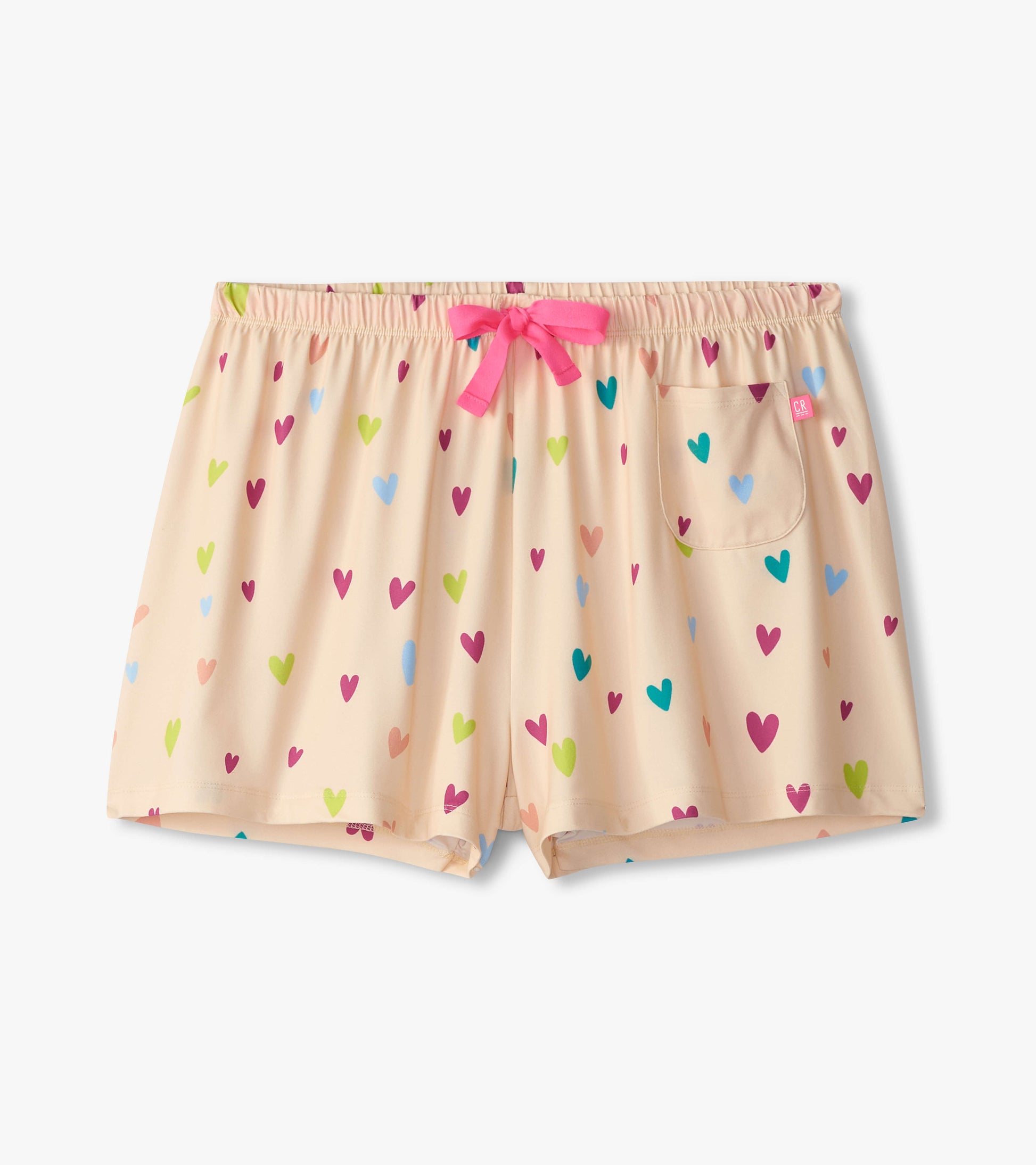 Peach polyknit pajama shorts with colorful heart pattern and pink drawstring, featuring a side pocket.