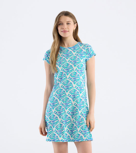 Short-sleeve t-shirt dress featuring a mosaic wave pattern in shades of blue and purple on a light background.