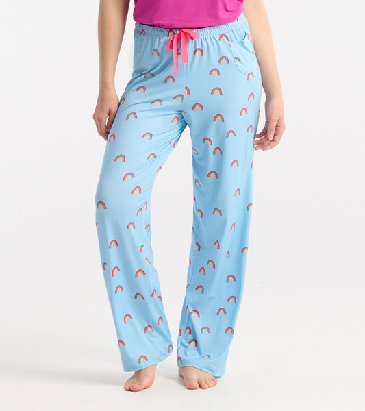 Light blue pajama pants featuring a playful rainbow pattern and an elastic waistband with a pink drawstring.