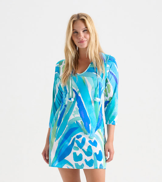 Colorful beach dress featuring a vibrant blue and green abstract pattern, with a relaxed fit and three-quarter sleeves.