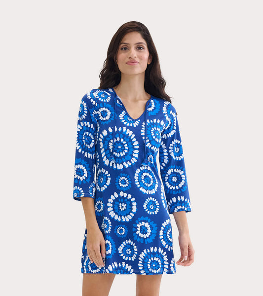 Blue mandala-patterned beach dress with a V-neck and three-quarter sleeves, suitable for seaside wear.