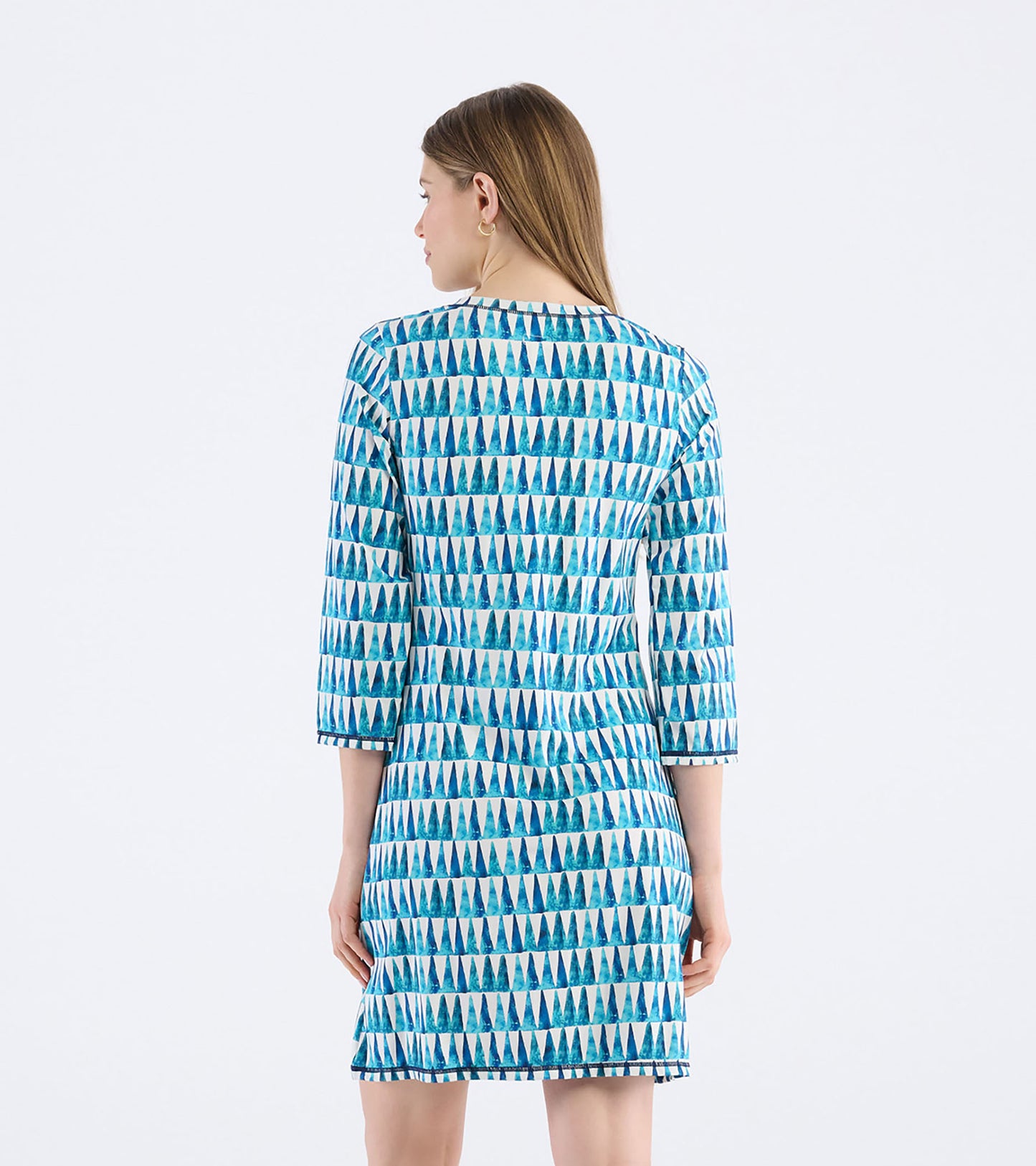 Back view of a women's dress featuring a painted triangle pattern in shades of blue and green on a white background.
