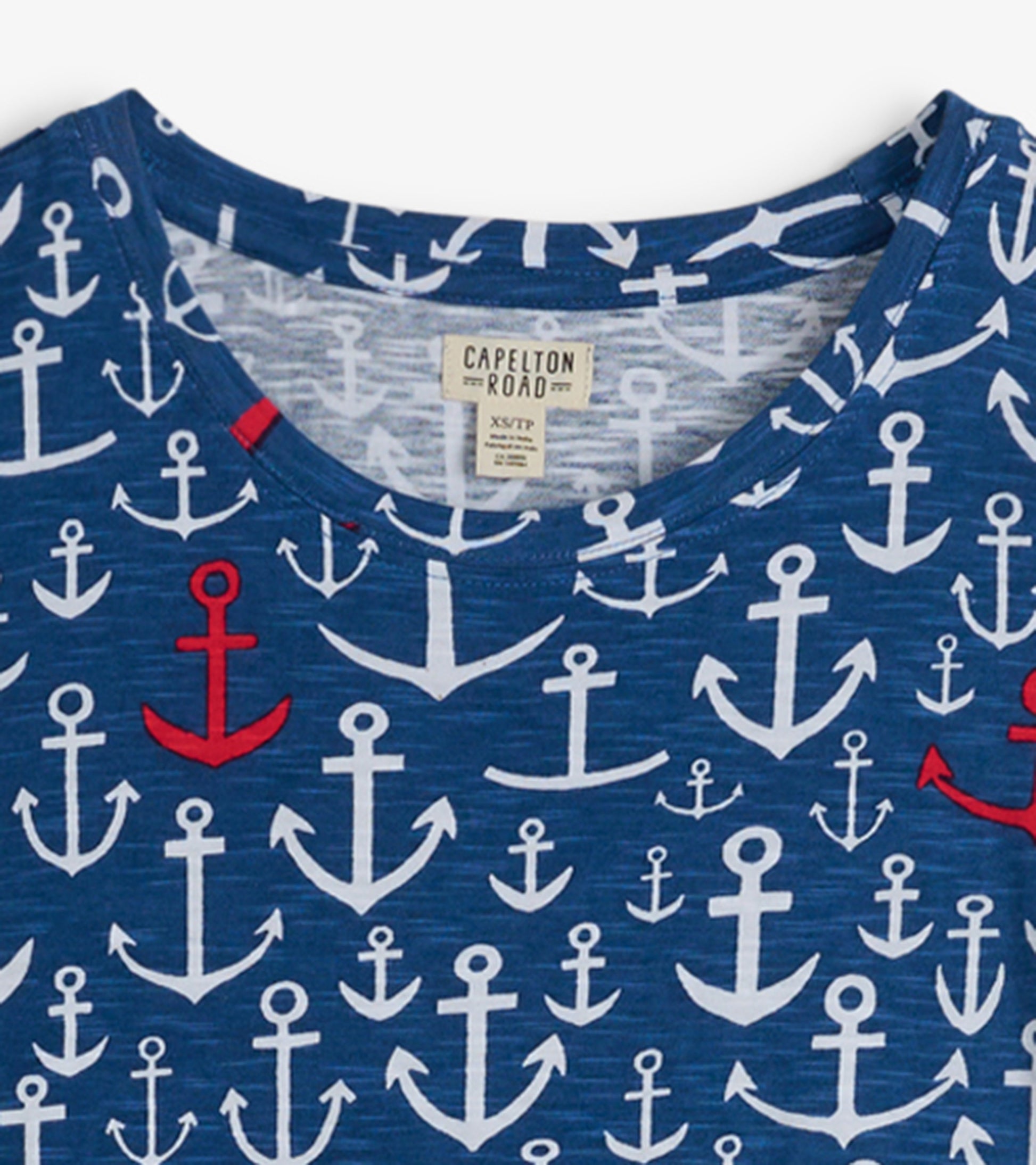 Navy crew neck t-shirt dress featuring a white and red anchor pattern, made from soft, lightweight fabric.