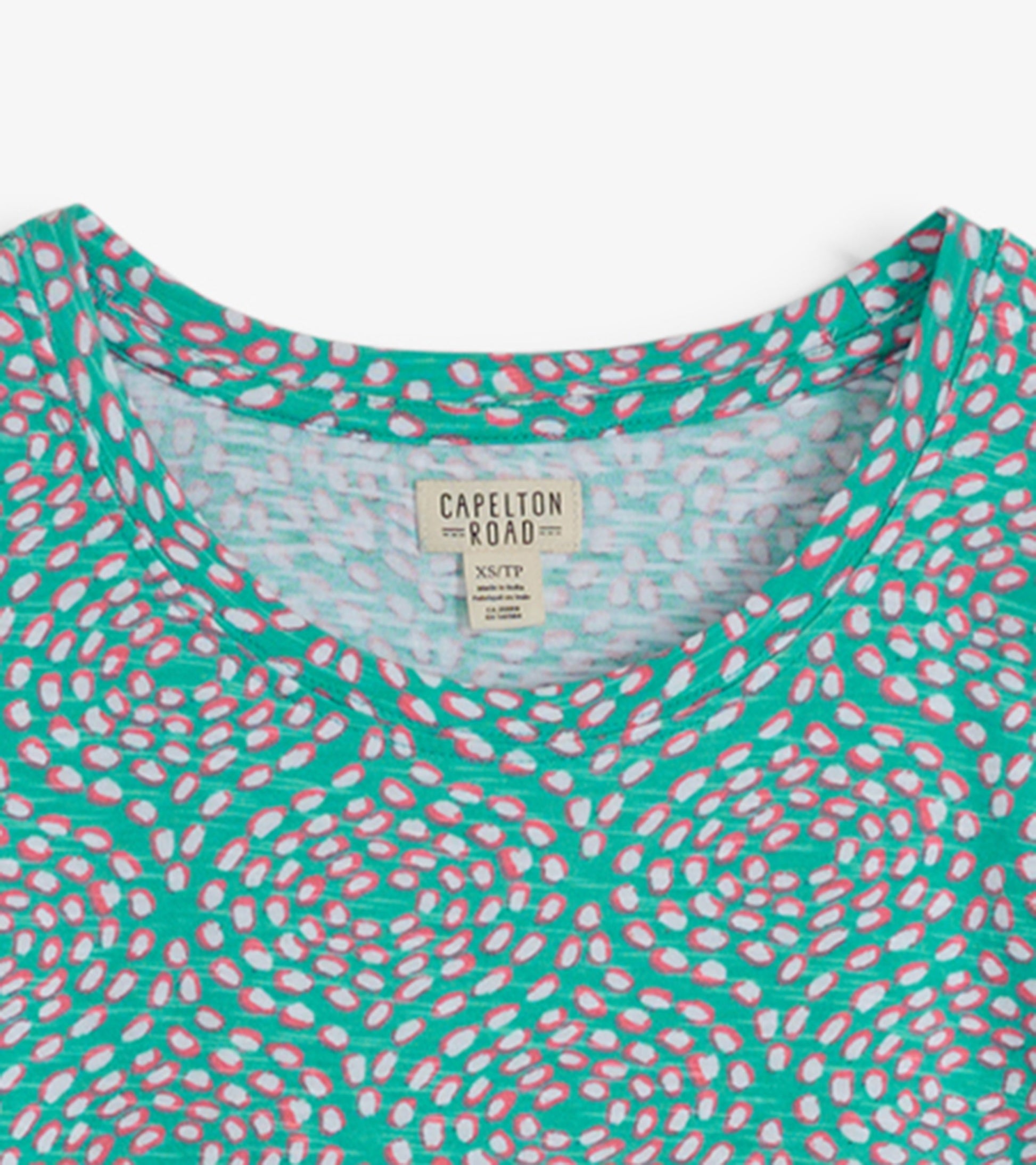 Turquoise crew neck t-shirt dress with a playful pink and white pattern, featuring a relaxed fit and soft fabric.