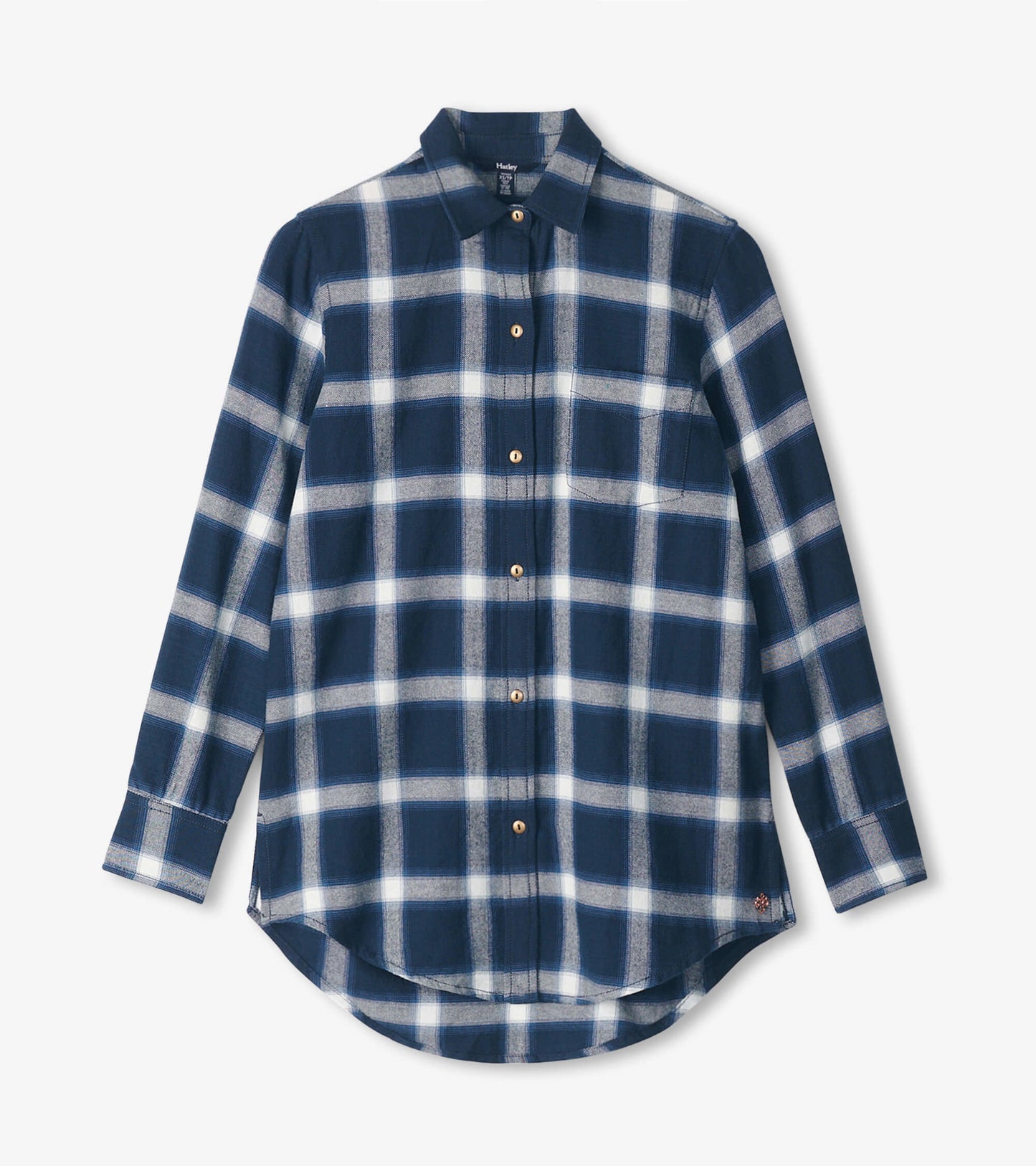 Navy tunic with a wide white windowpane pattern, long sleeves, button-up front, and a curved hem.