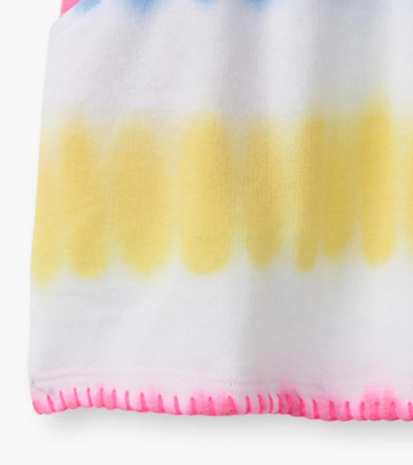 Colorful tie-dye dress featuring pink, yellow, and blue patterns with a soft fabric and a scalloped hem.