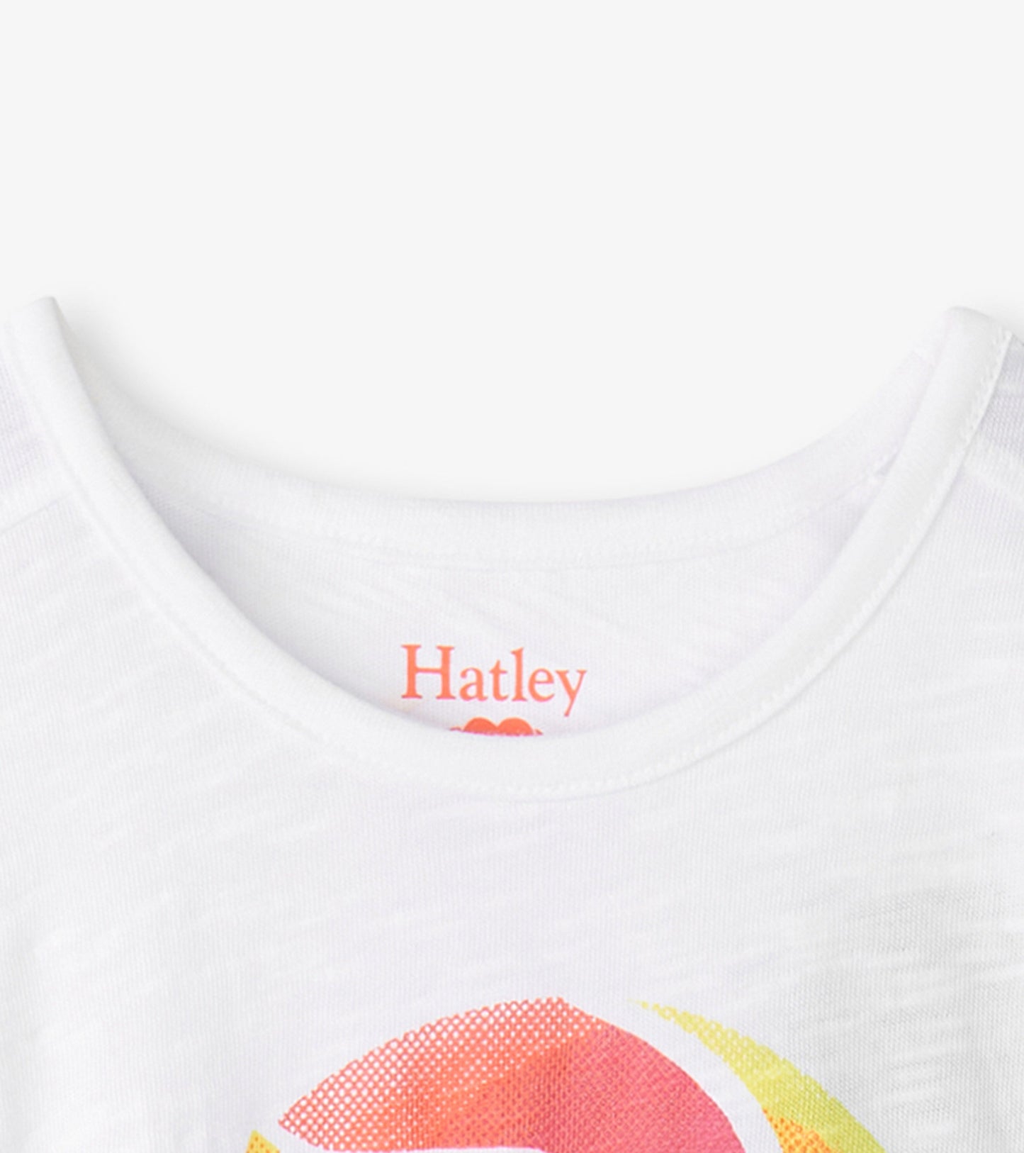 White relaxed t-shirt featuring a colorful sunshine graphic on the front, perfect for casual wear.