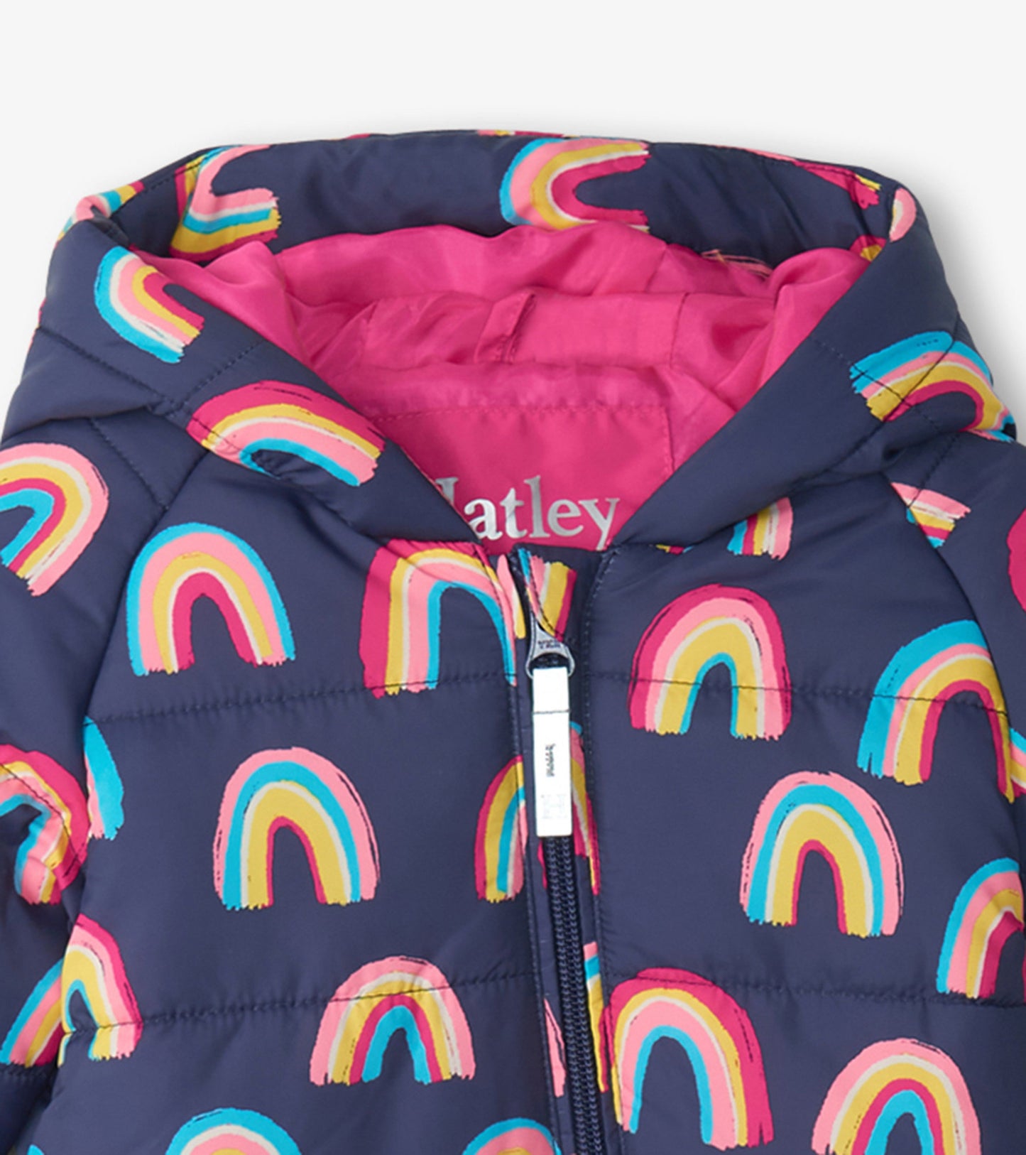 Navy baby snowsuit featuring colorful rainbow patterns and a pink lining, designed for warmth and comfort.
