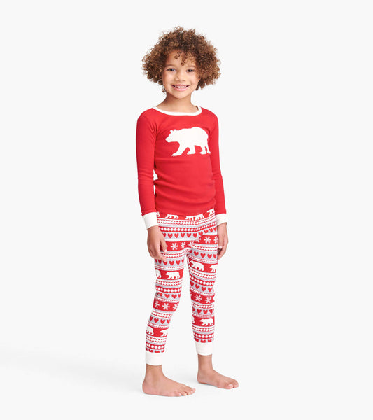Red long-sleeve pajama top with white bear appliqué, paired with patterned red and white pajama pants.