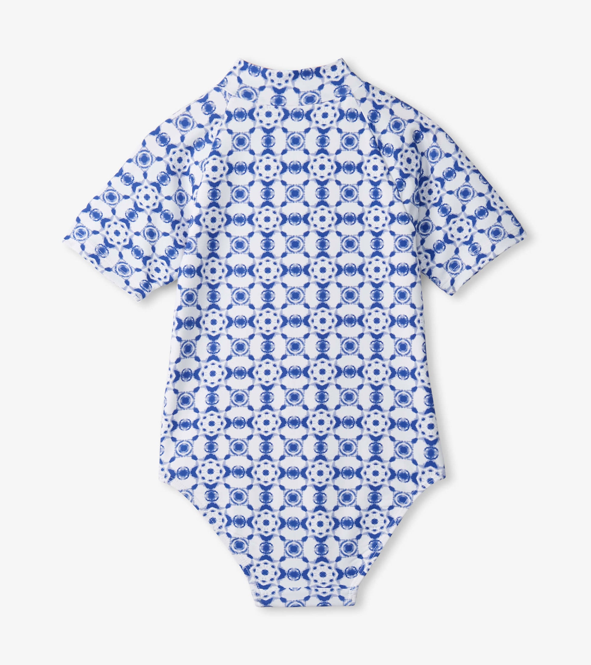 Short-sleeve one-piece rashguard featuring a blue and white kaleidoscope pattern, ideal for beach or pool use.