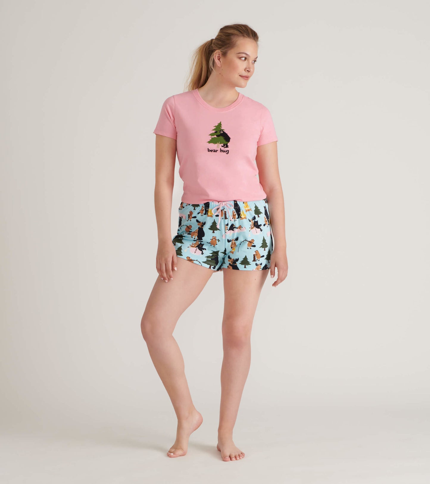 Light blue cotton sleep shorts with a playful forest animal print, featuring an elastic waistband and drawstring.