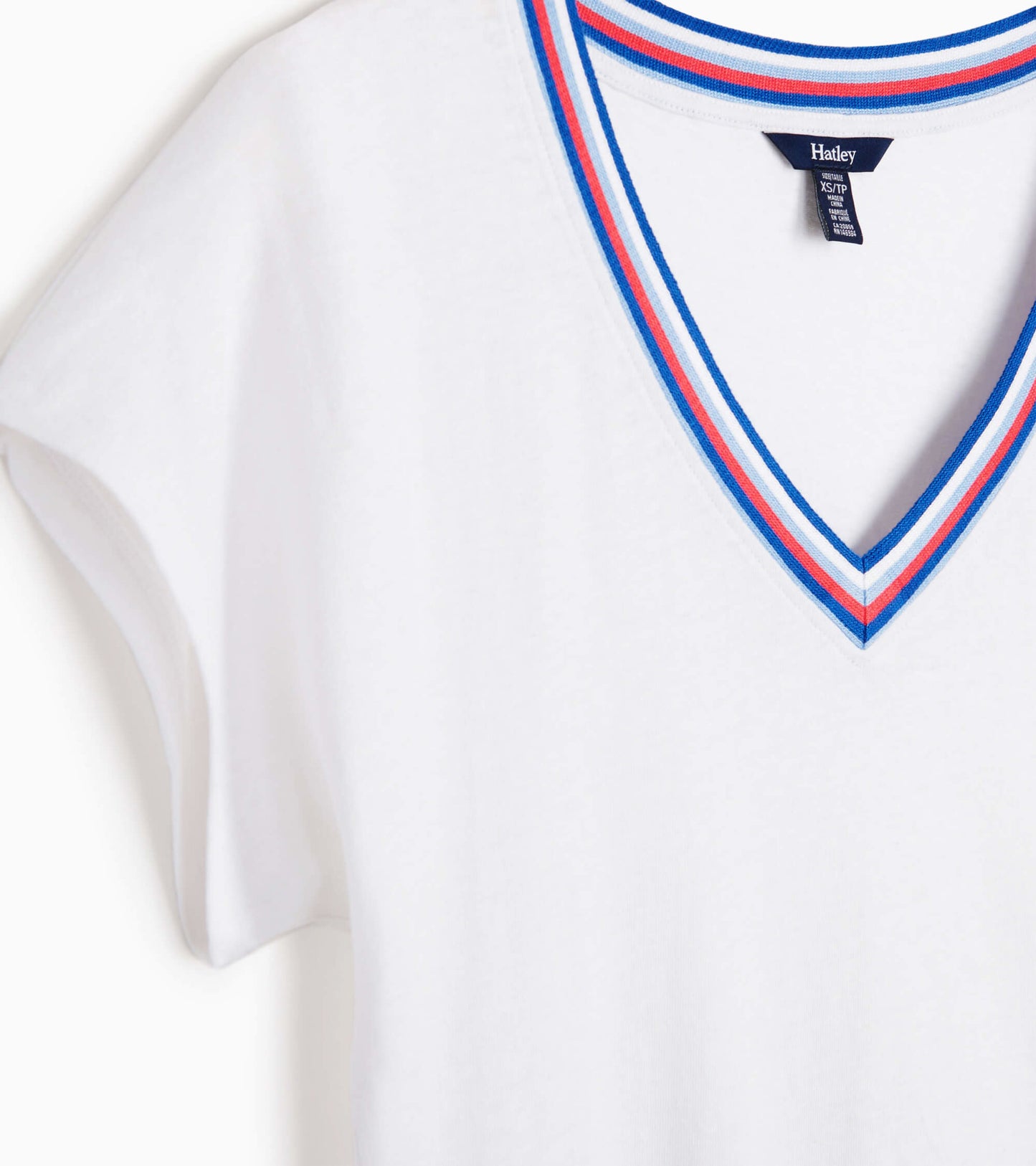 White V-neck tee featuring a colorful striped neckline, short sleeves, and a relaxed fit.