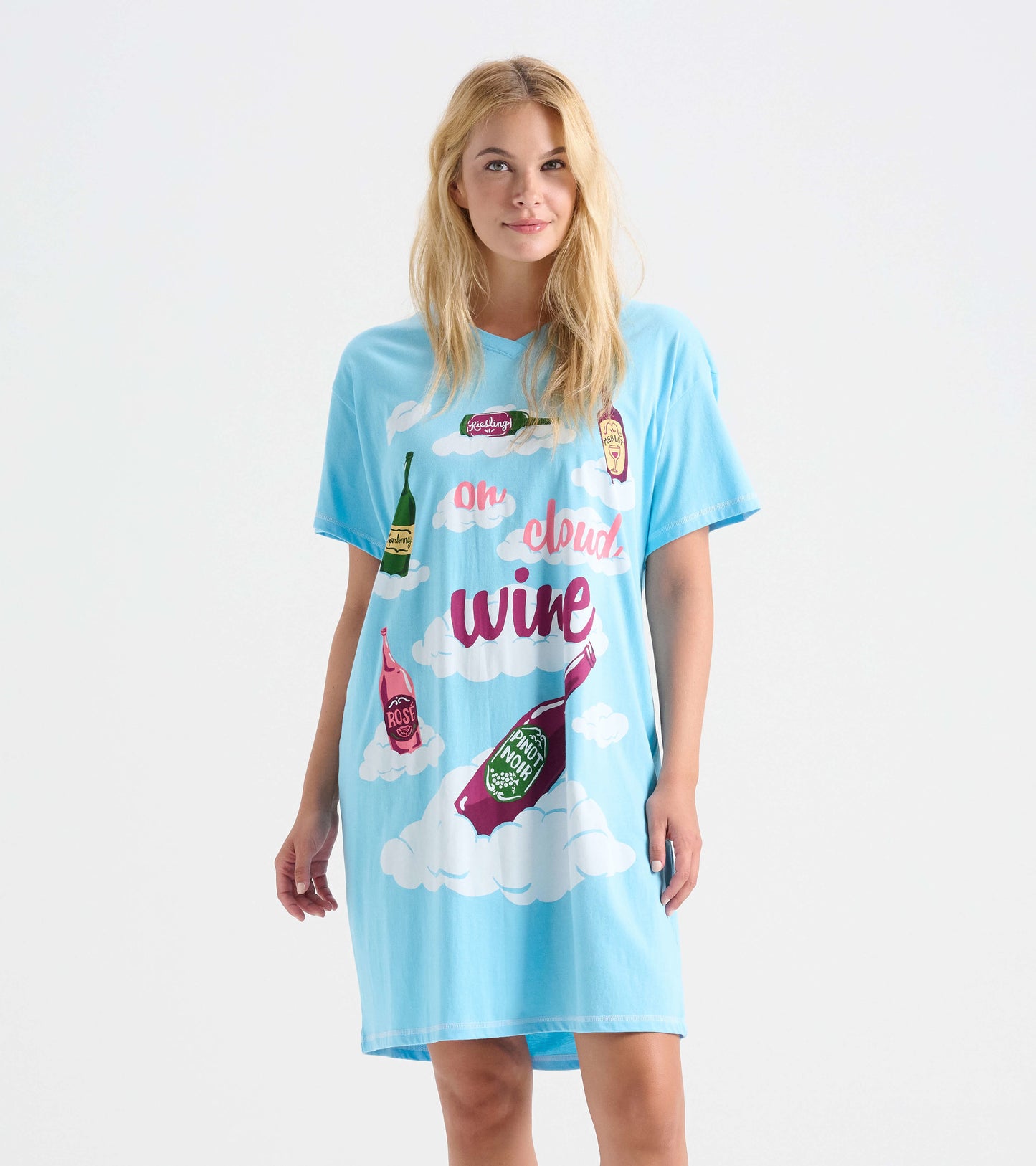 Light blue short-sleeve sleepshirt featuring colorful wine bottle graphics and cloud designs.