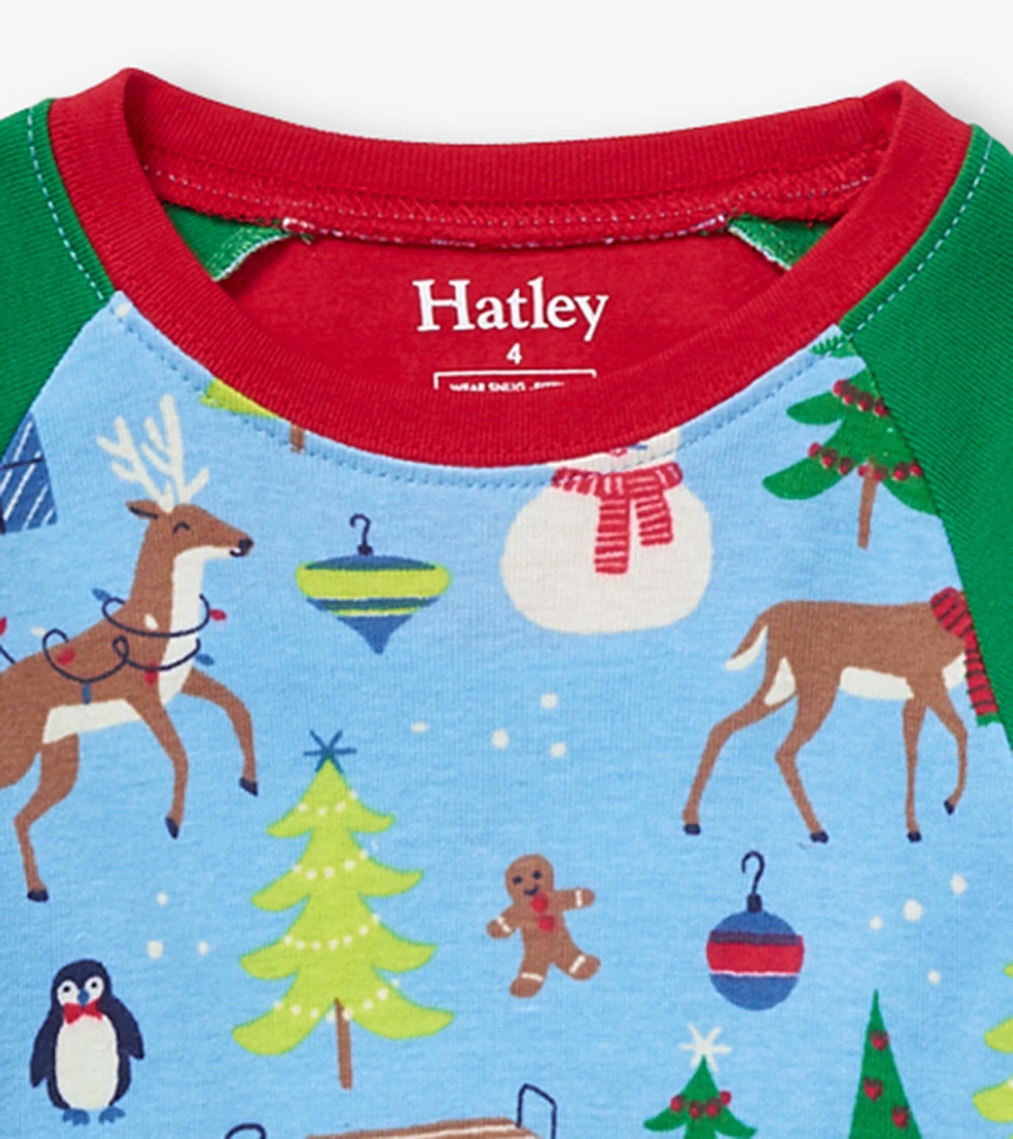 Pyjama avec haut à manches raglan pour enfant – Matin de Noël sur fond bleu
