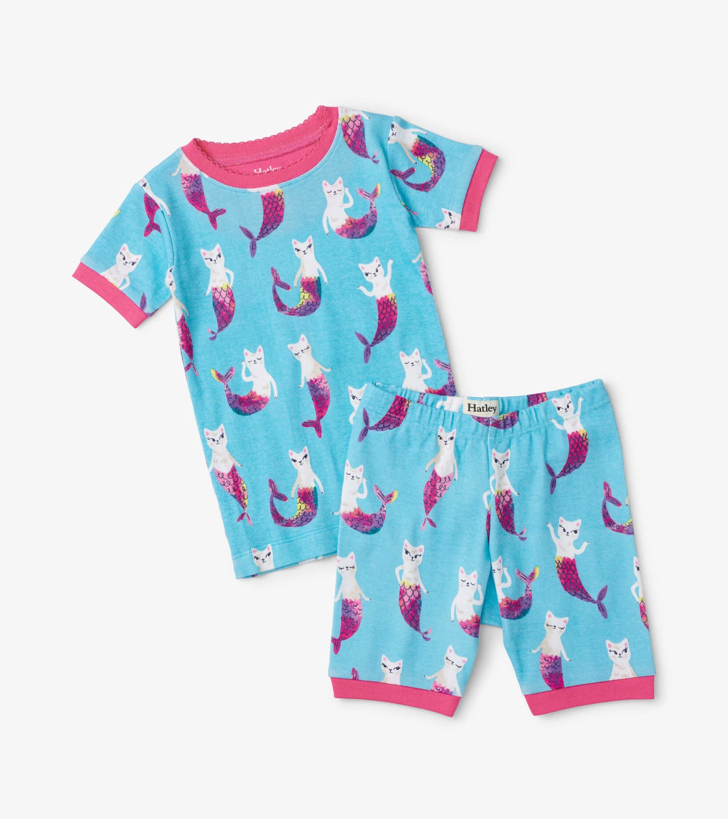 Short pajama set featuring a blue background with colorful mermaid cats, includes a short-sleeve top and shorts.