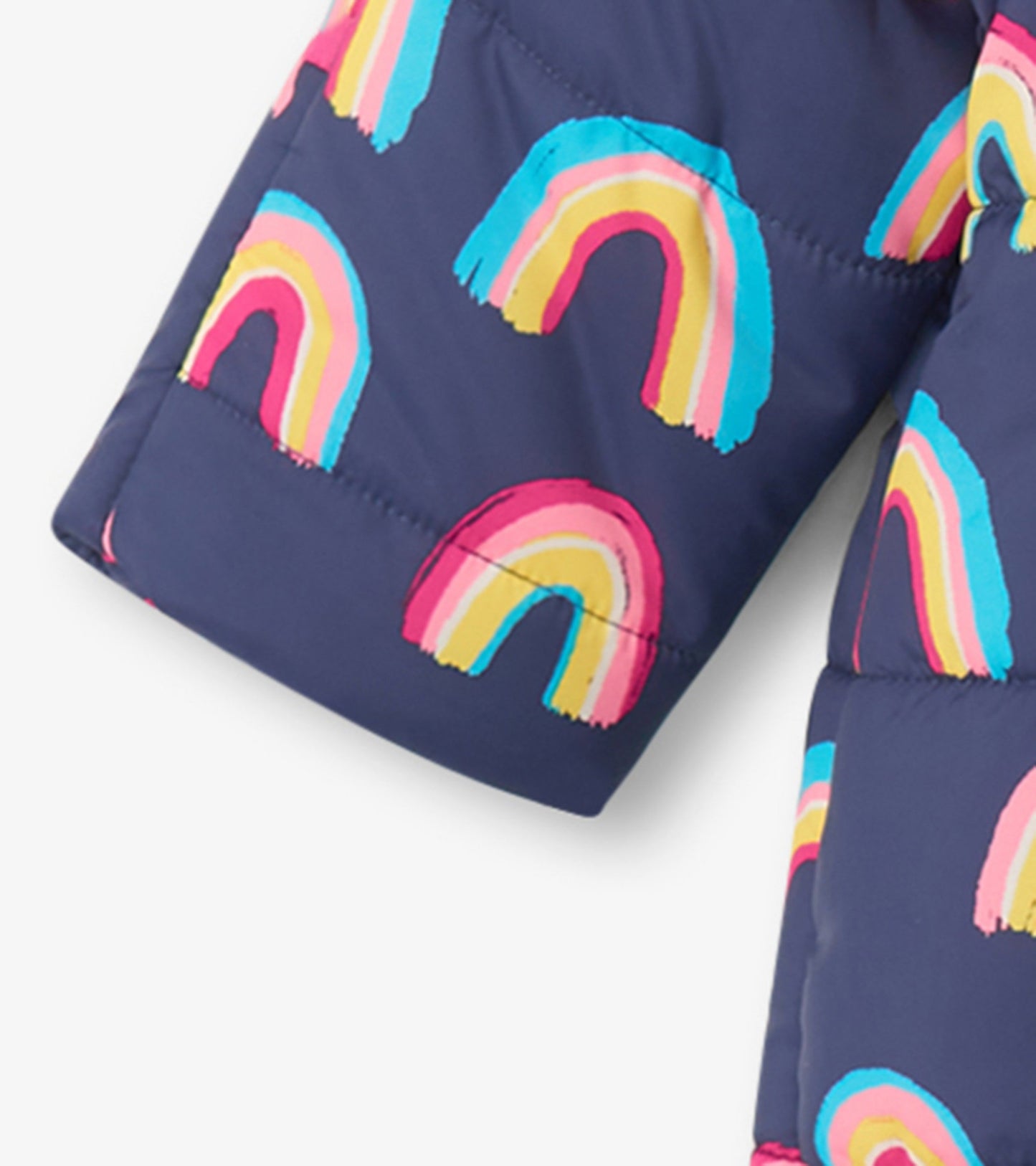 Navy baby snowsuit featuring colorful rainbow patterns, designed for warmth and comfort in cold weather.