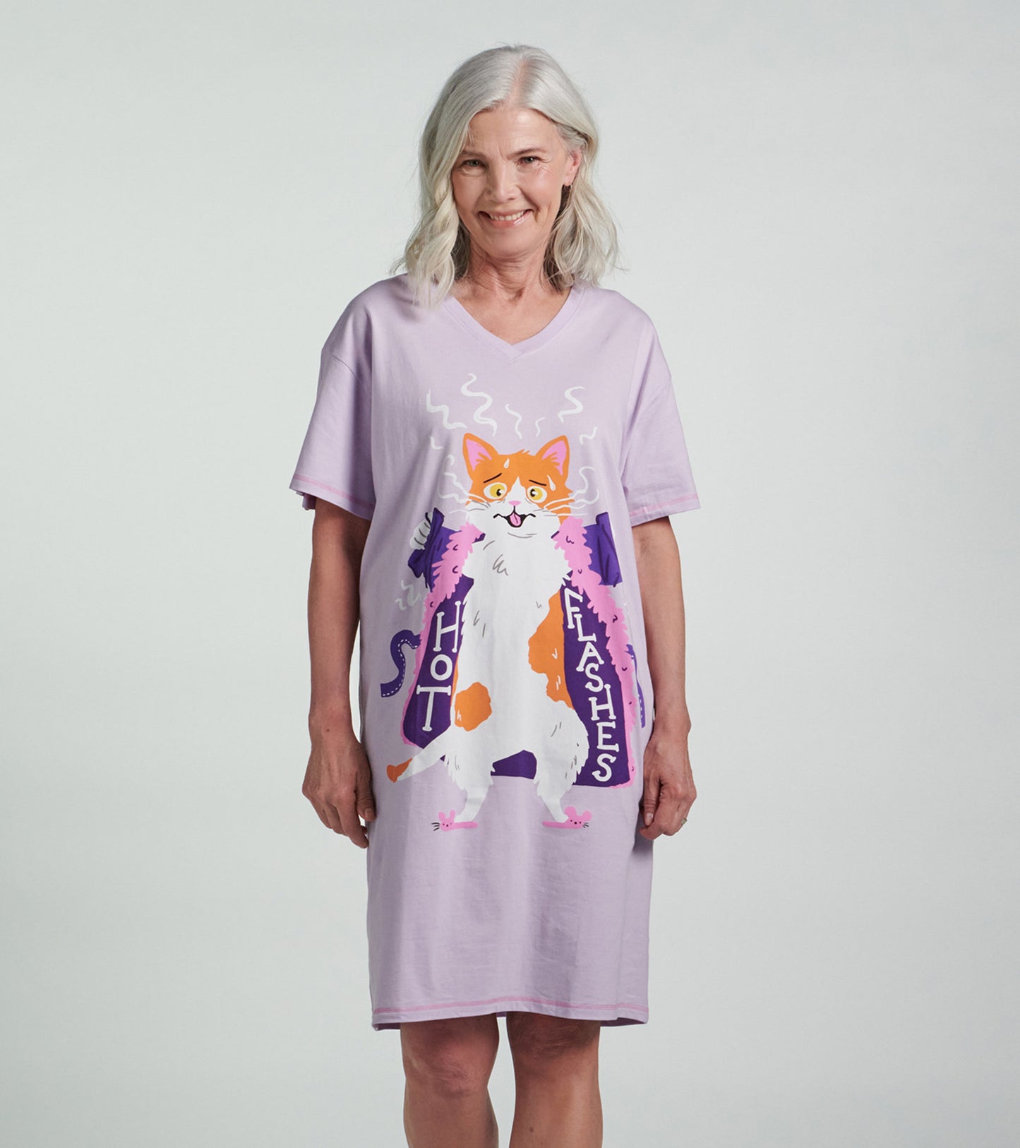Lavender sleepshirt featuring a playful cat graphic with the text "Hot Flashes," designed for comfort and relaxation.