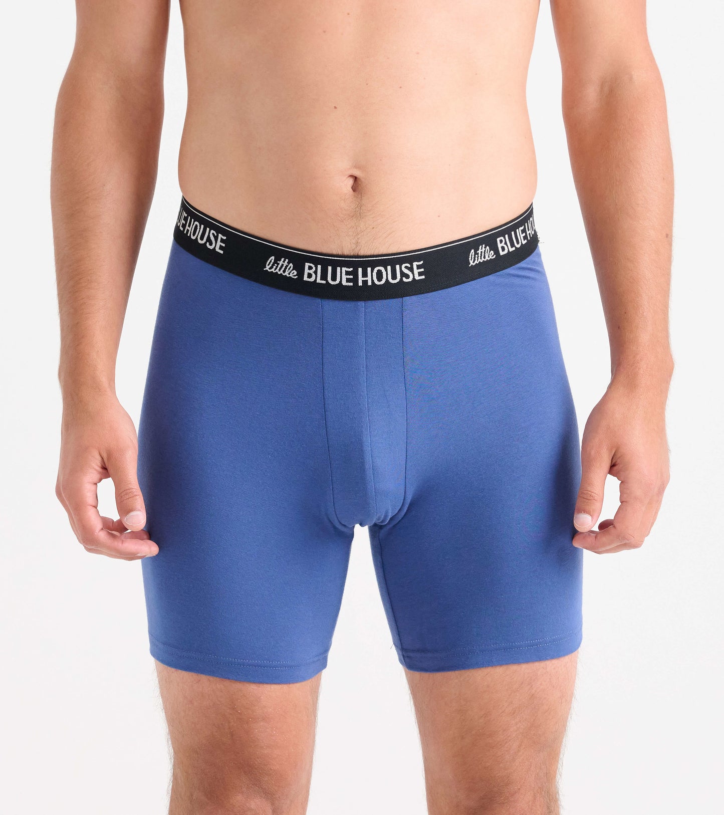 Men's boxer briefs in solid blue with a black waistband, featuring a snug fit and mid-thigh length.