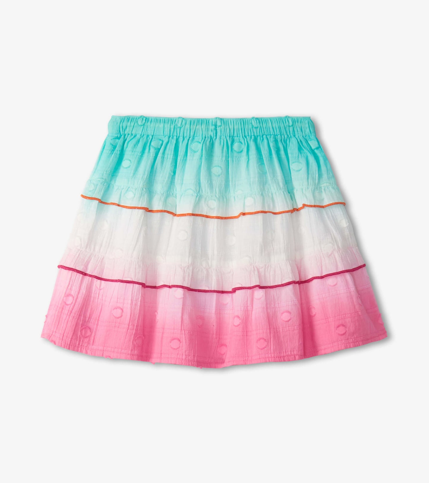 Tiered skirt featuring a gradient of aqua, white, and pink with textured dots and contrasting trim. Elastic waistband.