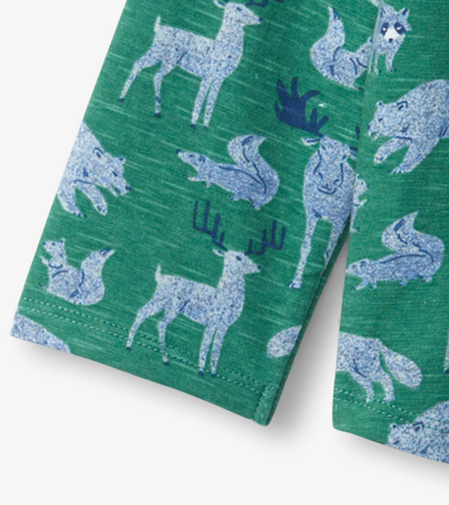 Green long sleeve t-shirt featuring a pattern of various forest animals in blue, suitable for infants and toddlers.