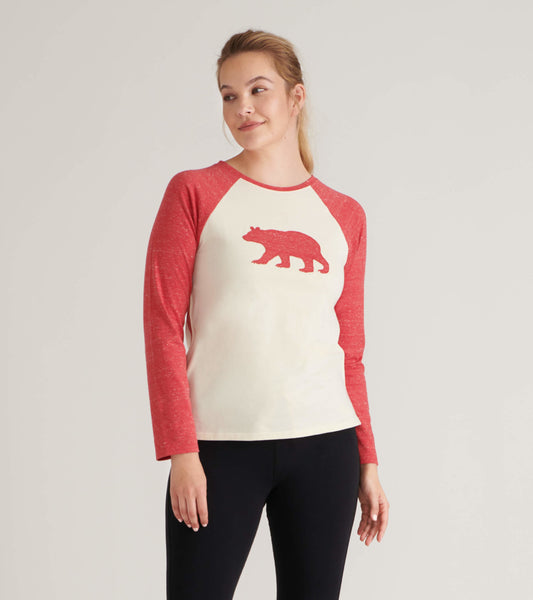 Red and cream raglan tee featuring a bear graphic, long sleeves, and a relaxed fit, worn by a model.