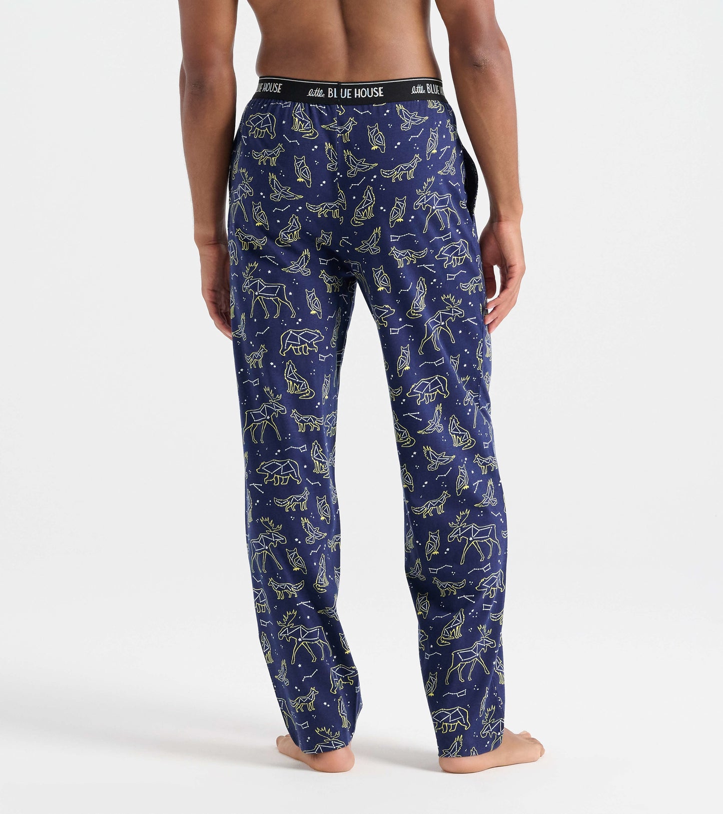 Navy cotton pajama pants featuring animal constellations in yellow, with an elastic waistband and a relaxed fit.
