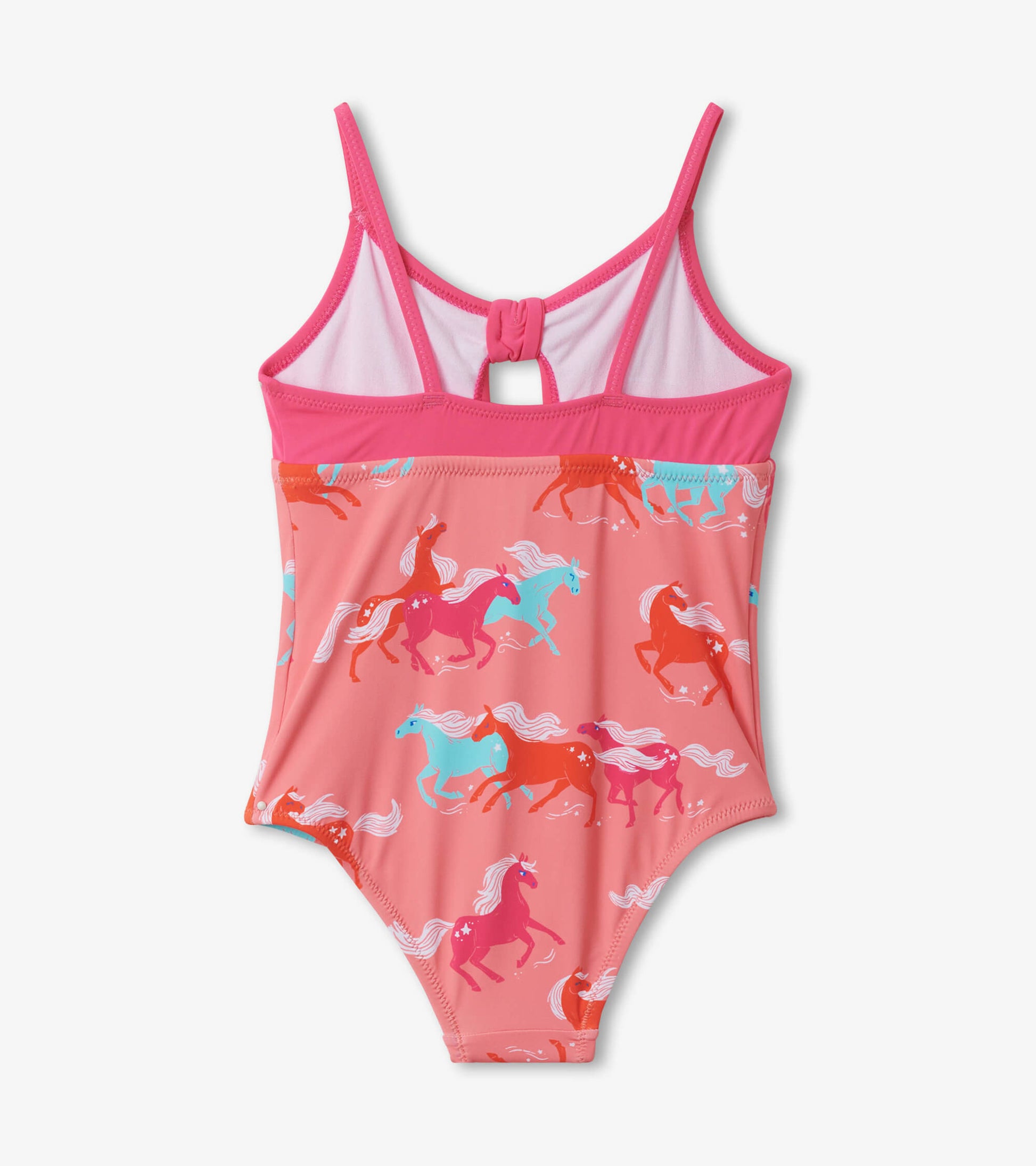 Pink swimsuit featuring playful horse patterns in various colors, with adjustable straps and a tie front detail.