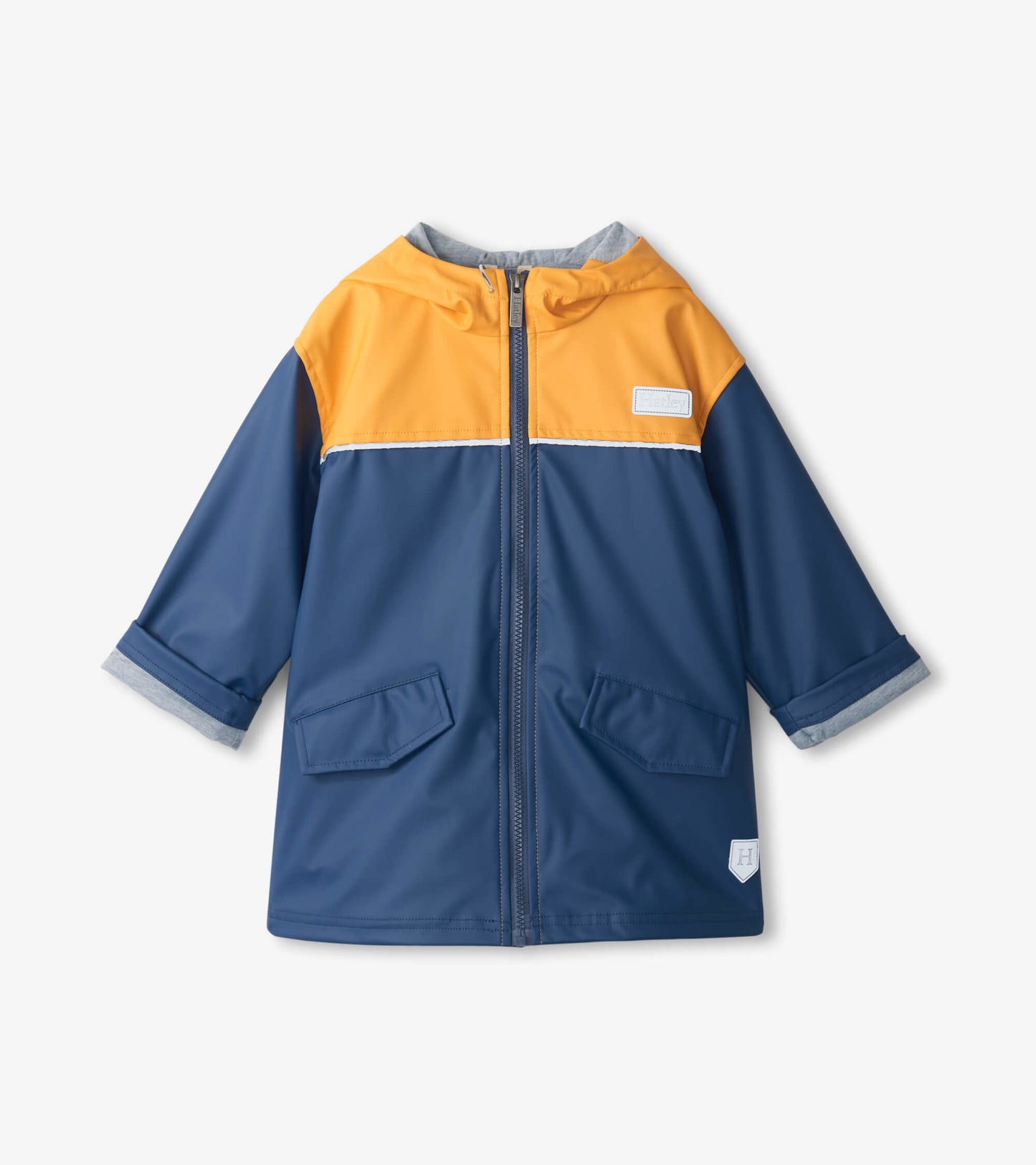 Yellow and navy zip-up rain jacket with a hood, featuring two front pockets and rolled sleeves.