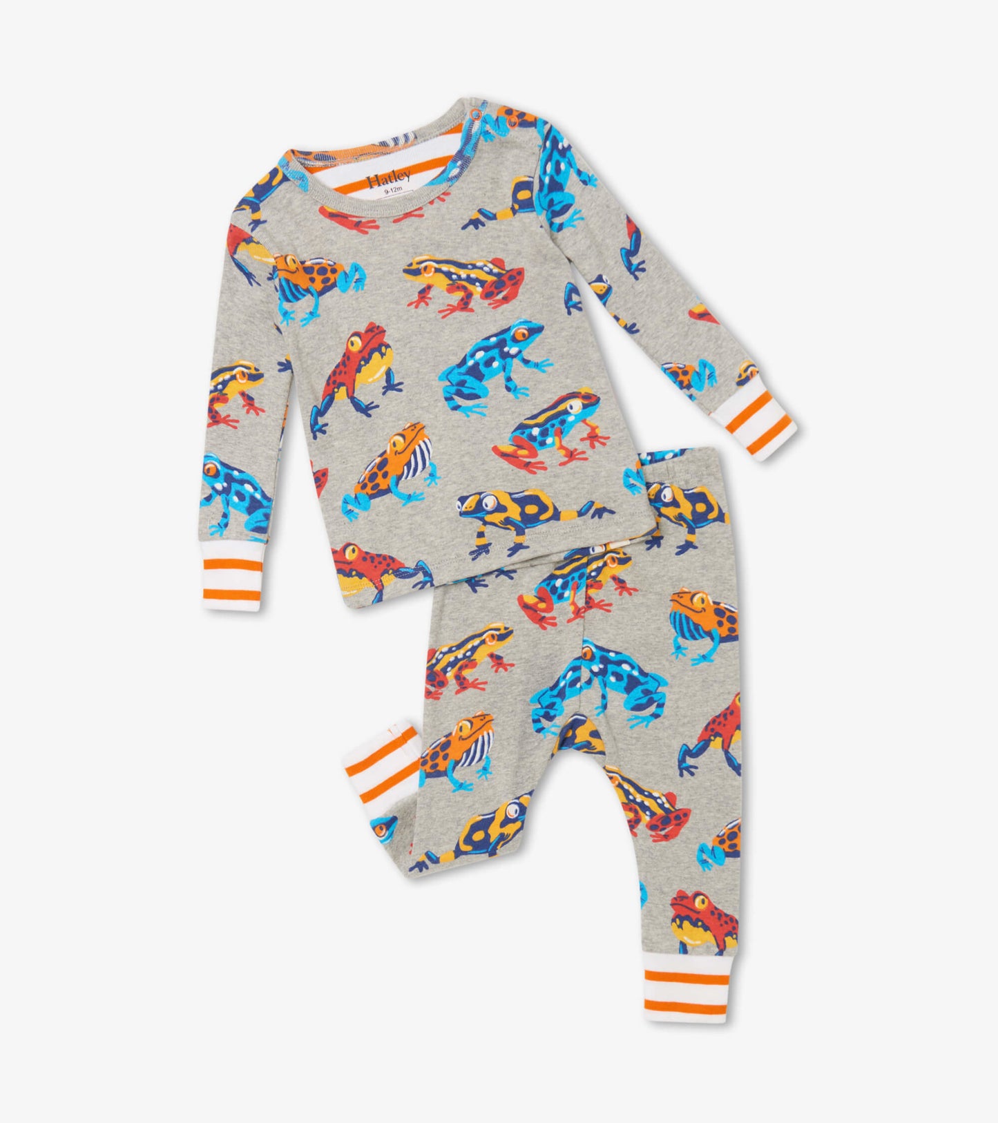 Gray organic cotton baby pajama set featuring colorful leaping frogs, with striped orange cuffs on the top and pants.
