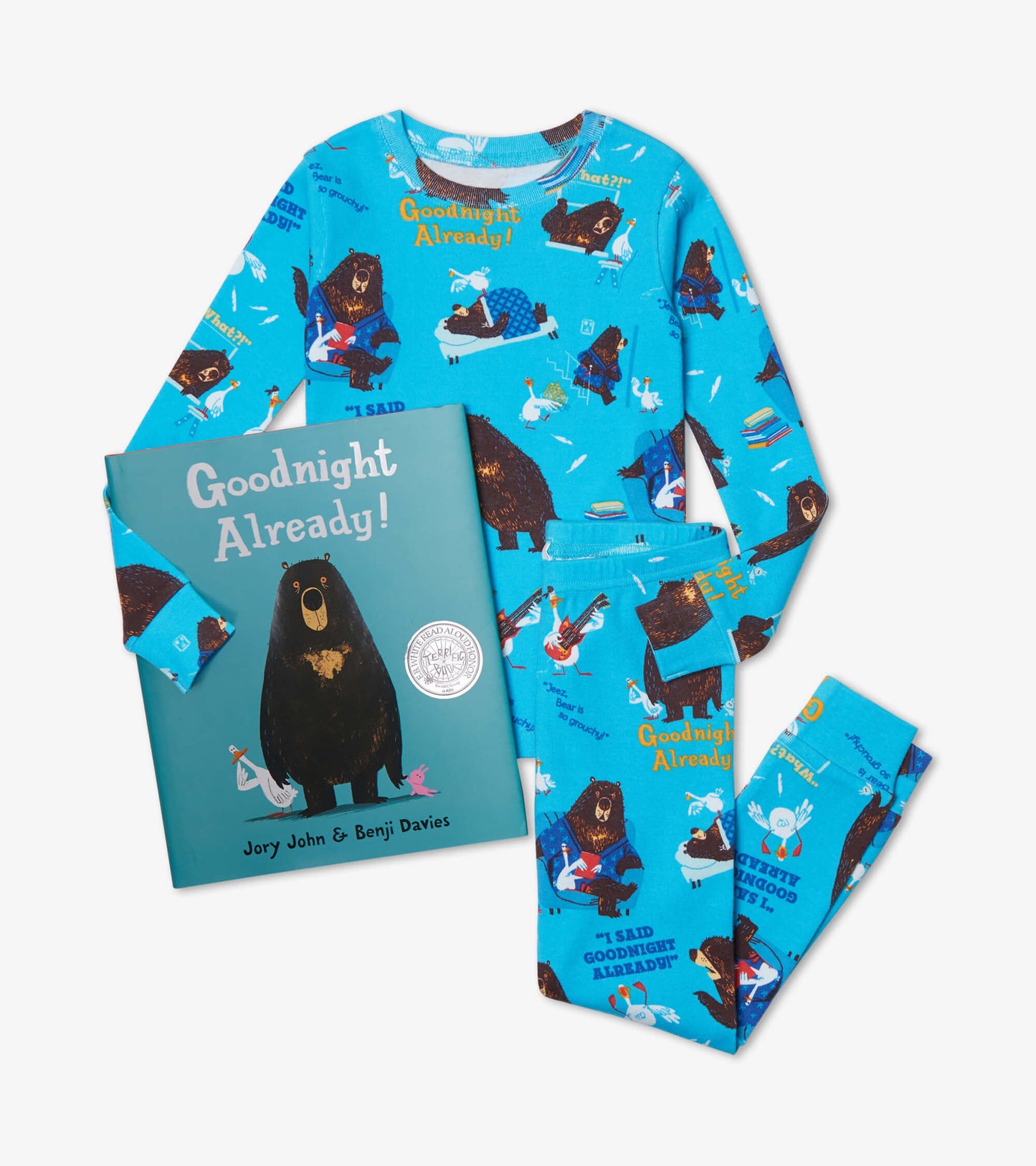 Blue pajama set featuring bear and bird patterns, paired with a children's book titled "Goodnight Already!