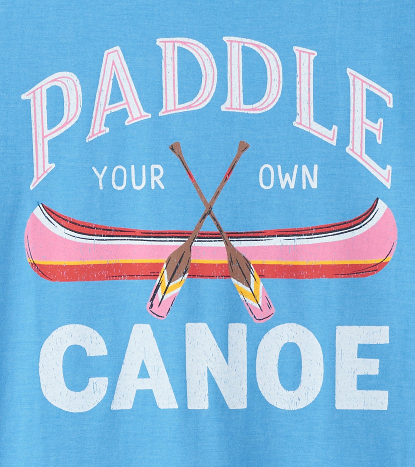 Light blue pajama t-shirt featuring a canoe graphic with the text "Paddle Your Own Canoe" in playful lettering.