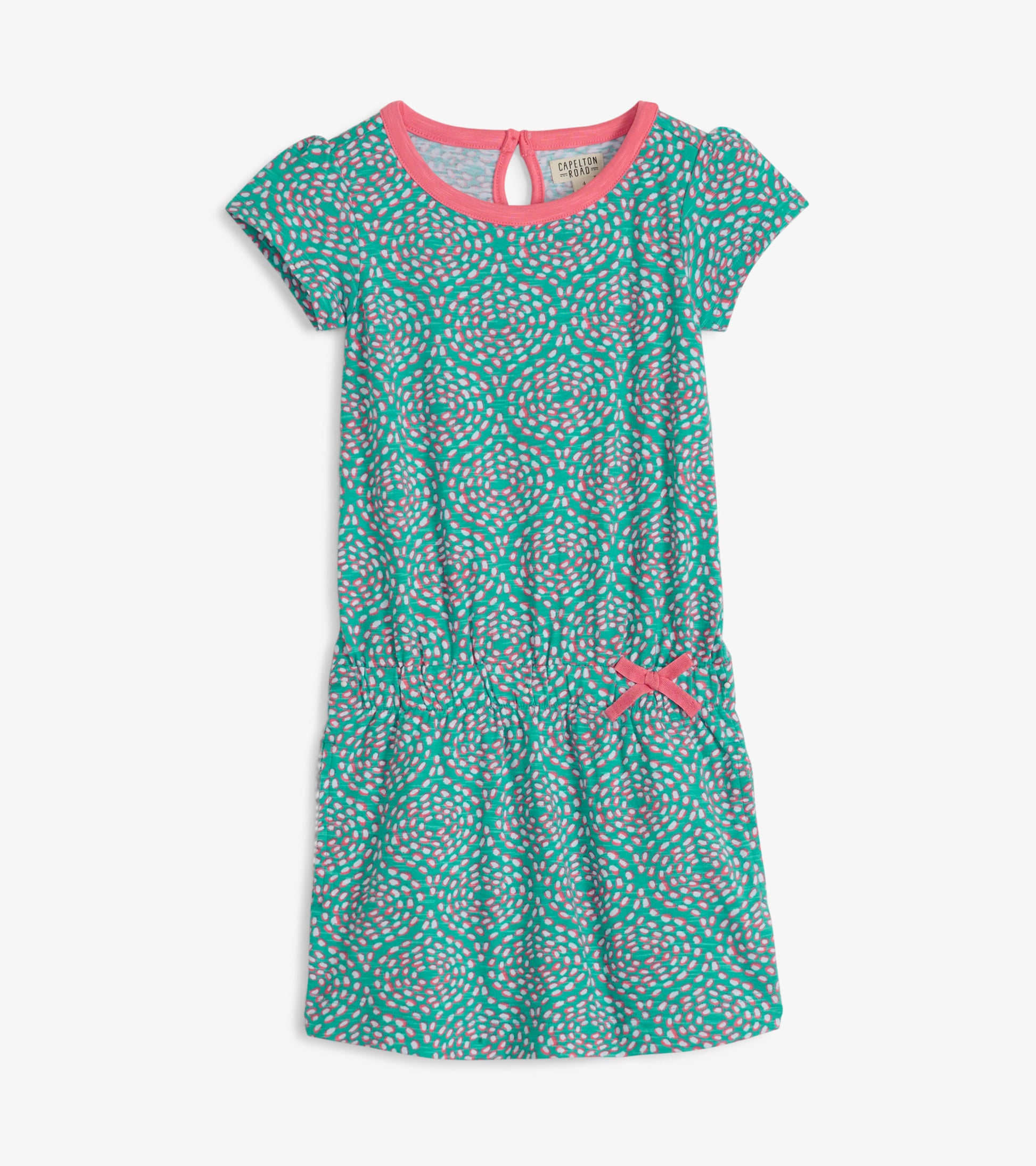 Teal t-shirt dress with pink and gray pattern, short sleeves, elastic waist, and a decorative bow detail.