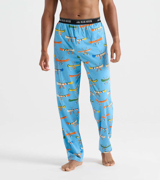 Light blue cotton pajama pants featuring a colorful canoe pattern, with an elastic waistband and relaxed fit.