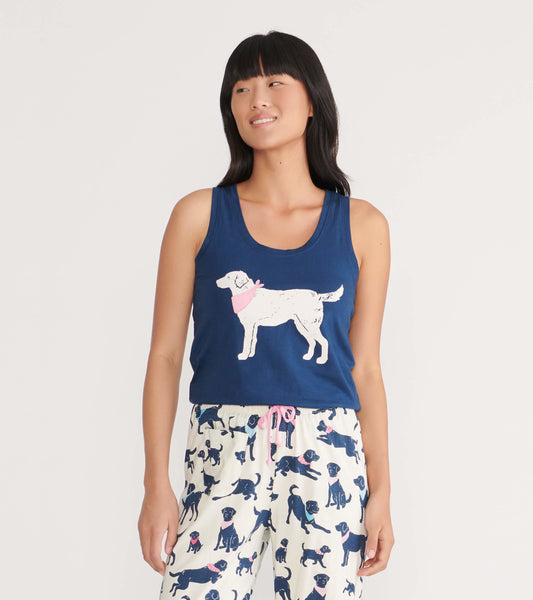 Navy tank top featuring a white dog graphic with a pink bandana, paired with patterned pajama pants.