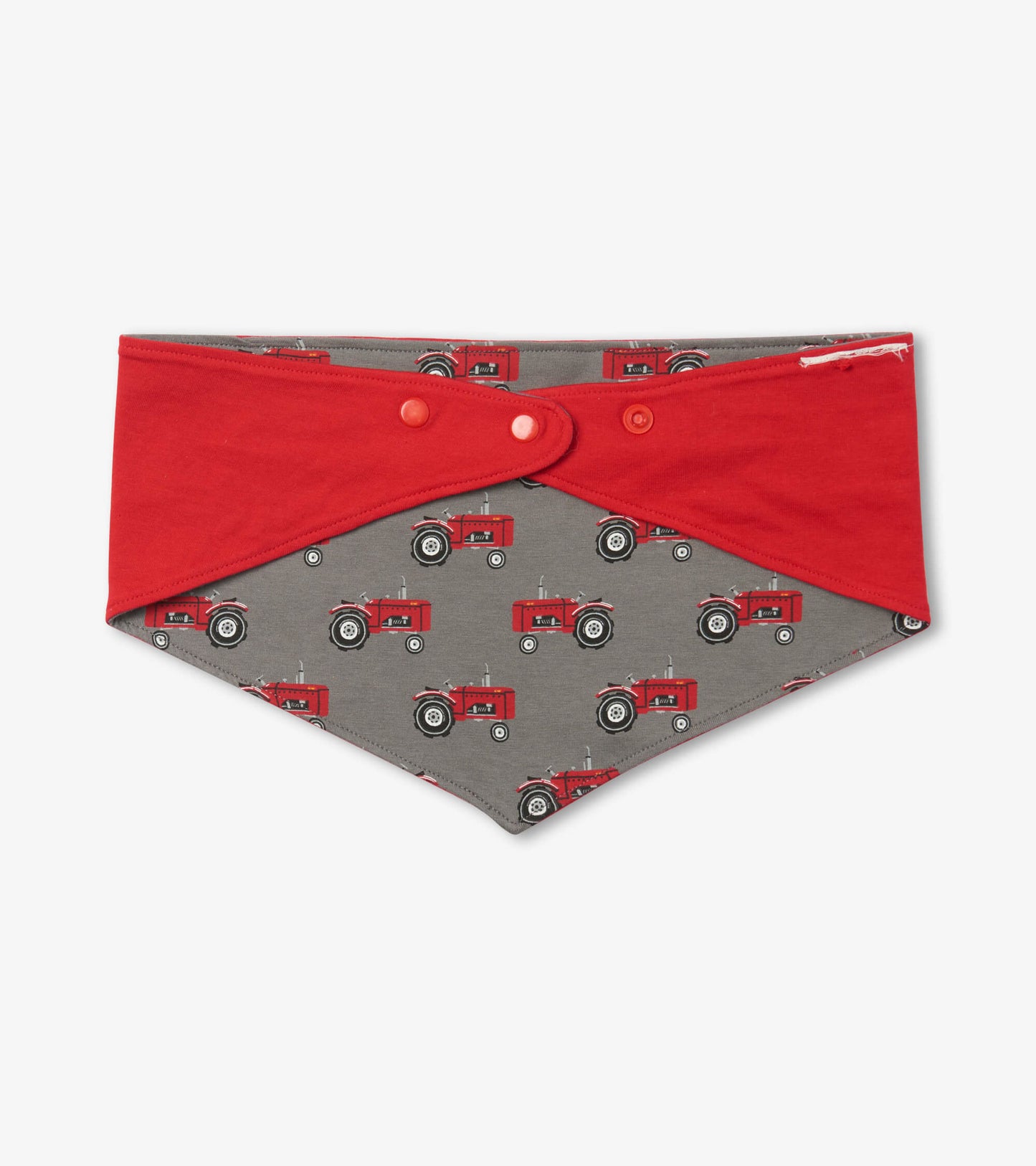 Reversible dog bandana featuring a gray tractor print with red accents, suitable for small to XL dogs.