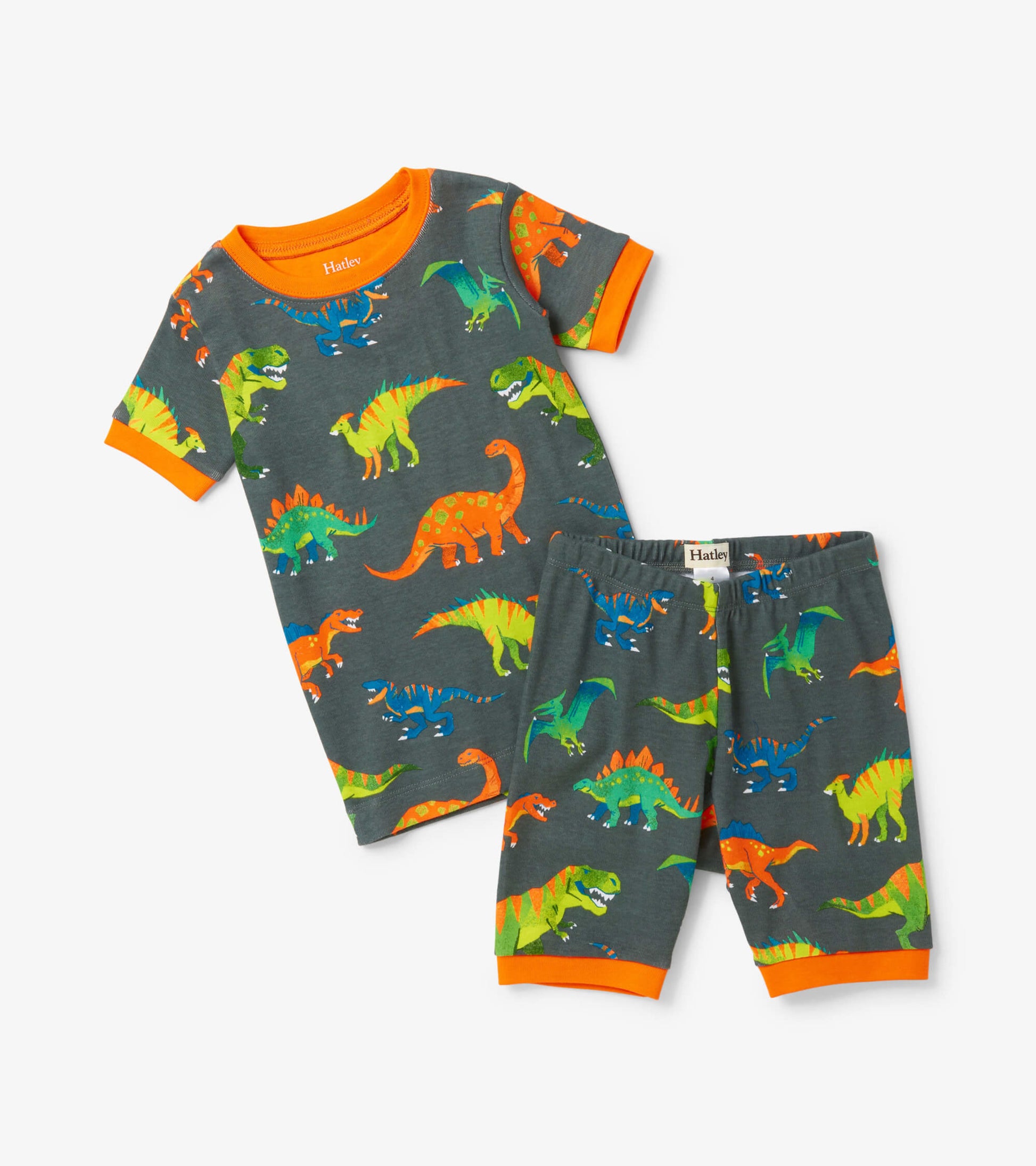 Grey short pajama set featuring colorful dinosaur prints and orange trim on the shirt and shorts.