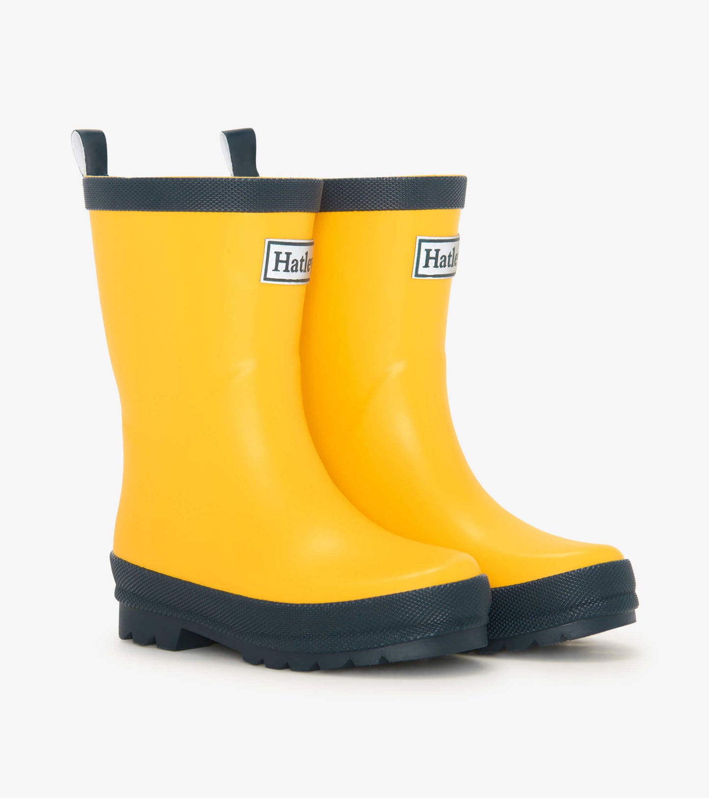 Yellow and navy matte rain boots with a textured sole and pull tabs for easy wear. Ideal for kids on rainy days.