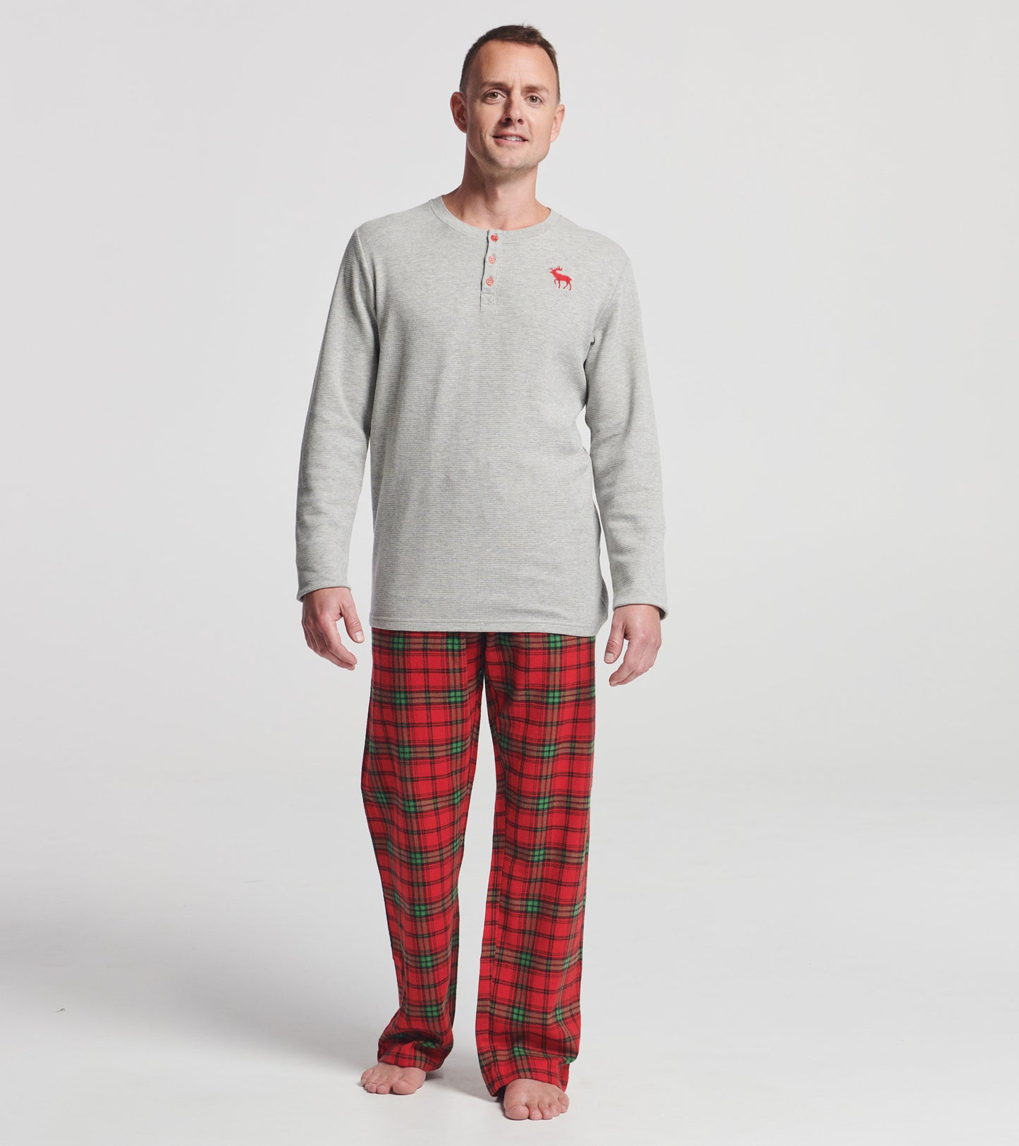 Red and green plaid flannel pajama pants, relaxed fit, ideal for holiday lounging.